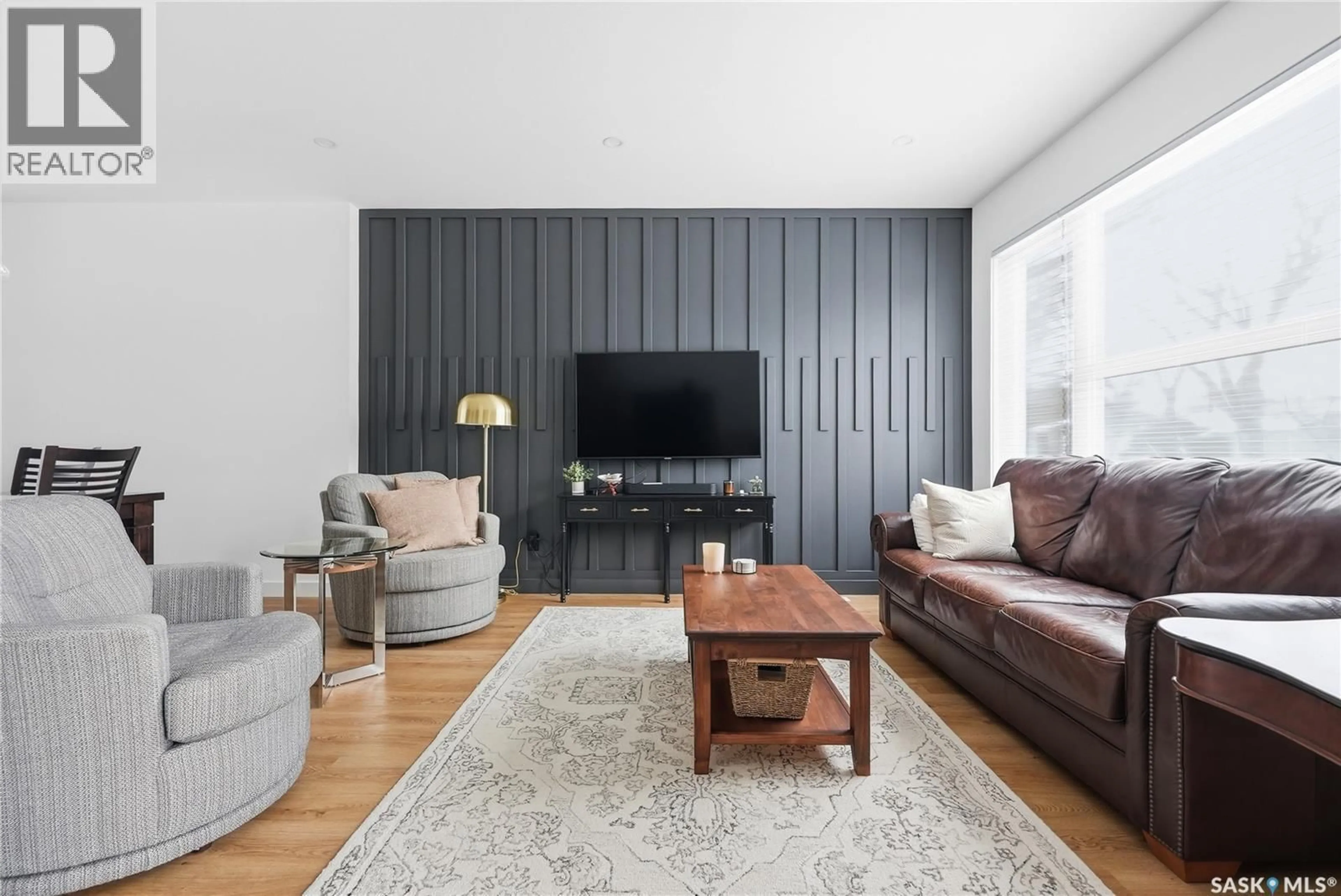 Living room with furniture, wood/laminate floor for 1416 ALEXANDRA AVENUE, Saskatoon Saskatchewan S7K3B9