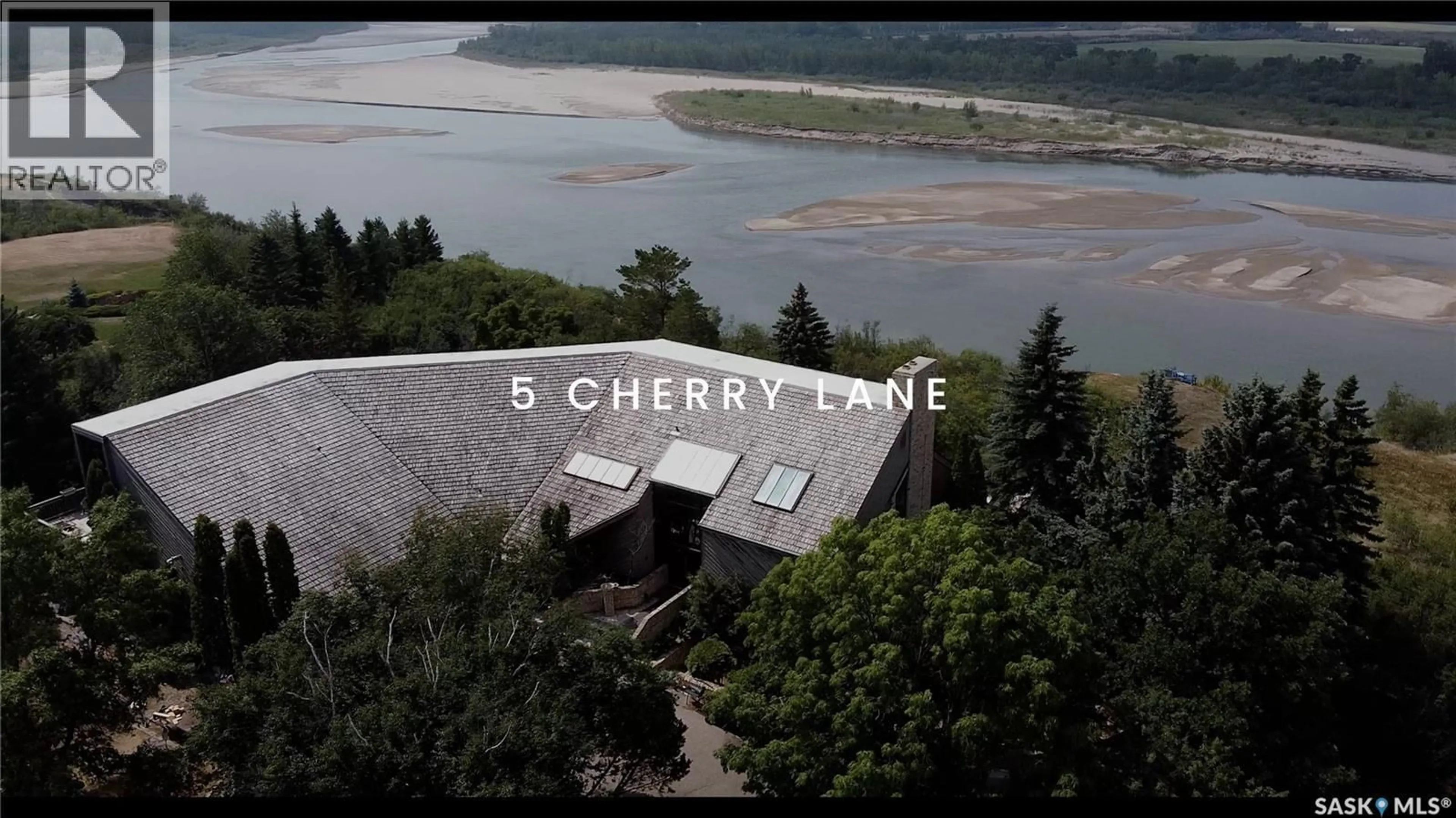 A pic from outside/outdoor area/front of a property/back of a property/a pic from drone, water/lake/river/ocean view for 5 CHERRY LANE, Corman Park Rm No. 344 Saskatchewan S7T1A2