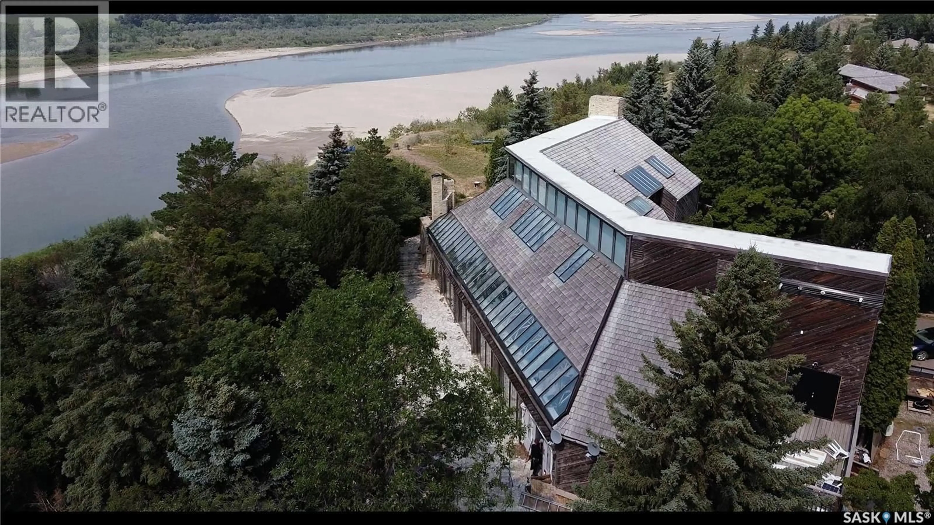 A pic from outside/outdoor area/front of a property/back of a property/a pic from drone, water/lake/river/ocean view for 5 CHERRY LANE, Corman Park Rm No. 344 Saskatchewan S7T1A2