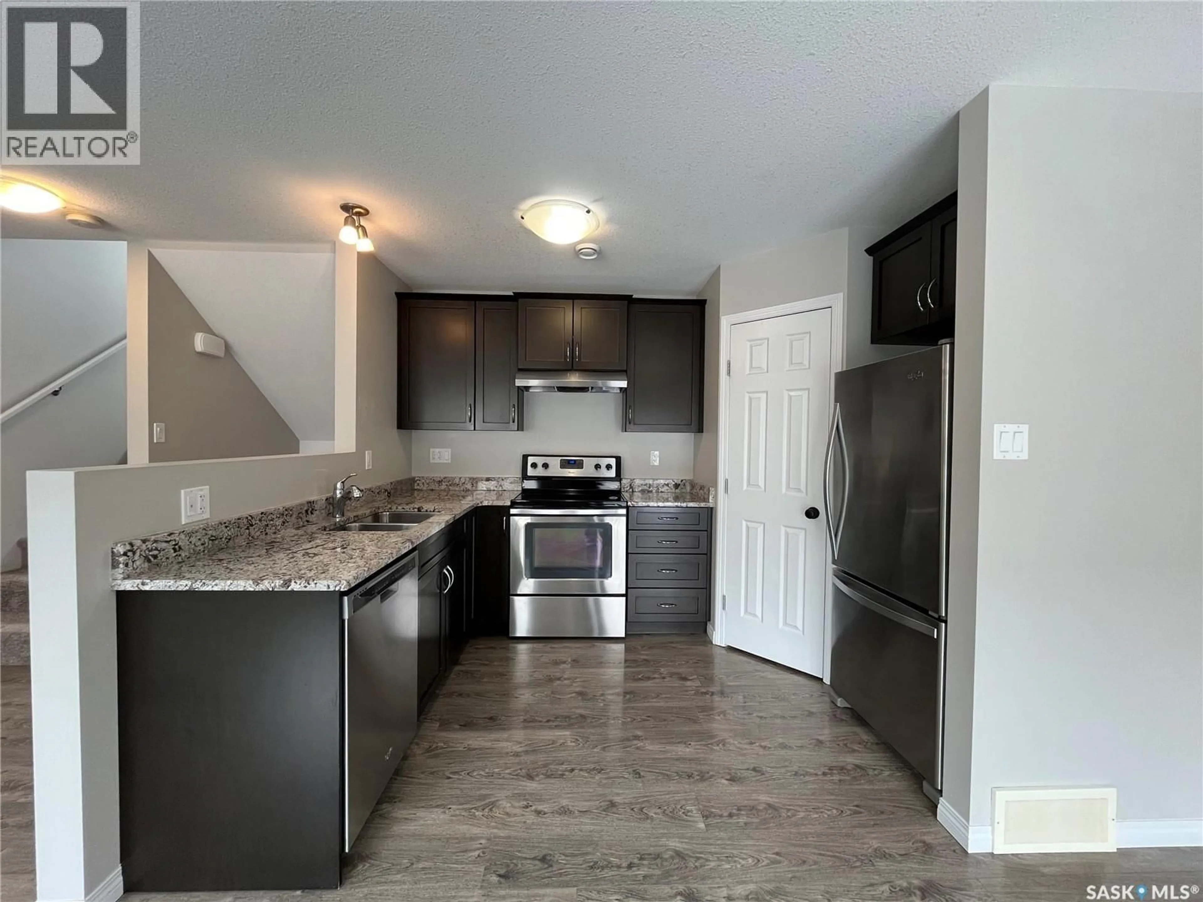 Open concept kitchen, unknown for 10 - 540 KEENE DRIVE, Swift Current Saskatchewan S9H4V9