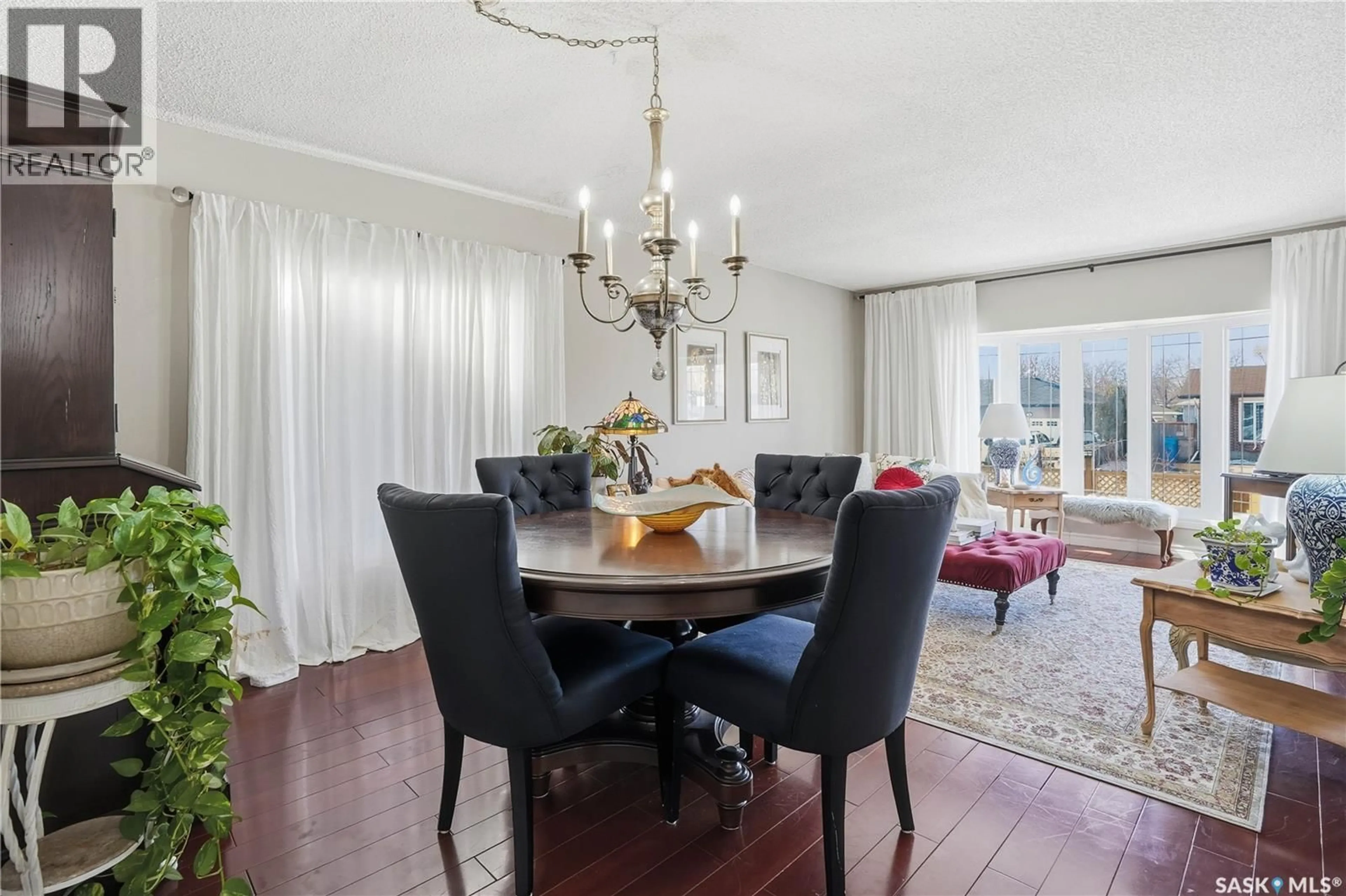 Dining room, wood/laminate floor for 19 TATE STREET, Regina Saskatchewan S4X1X3