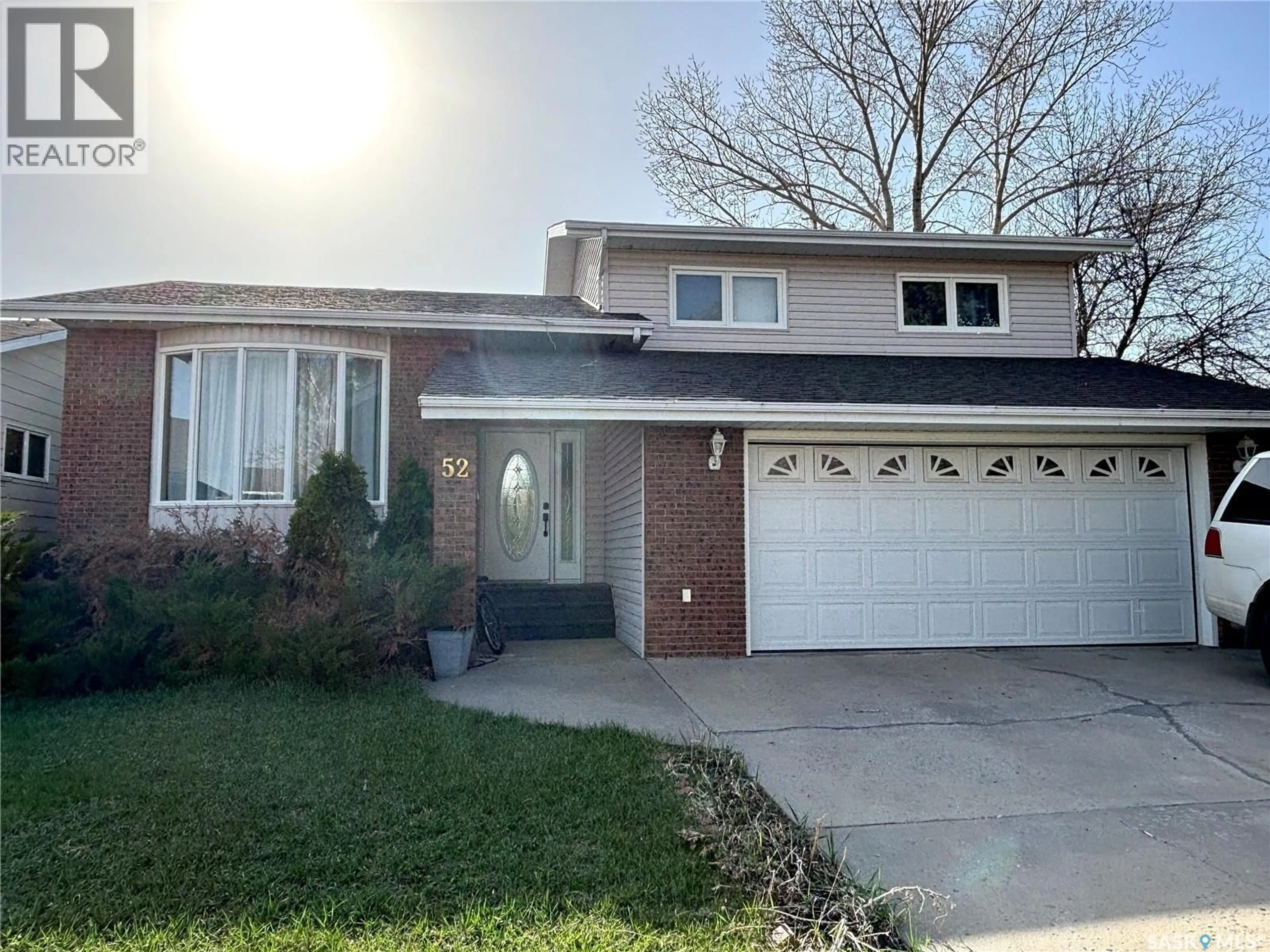 Home with vinyl exterior material, street for 52 HARRIGAN CRESCENT, Maple Creek Saskatchewan S0N1N0