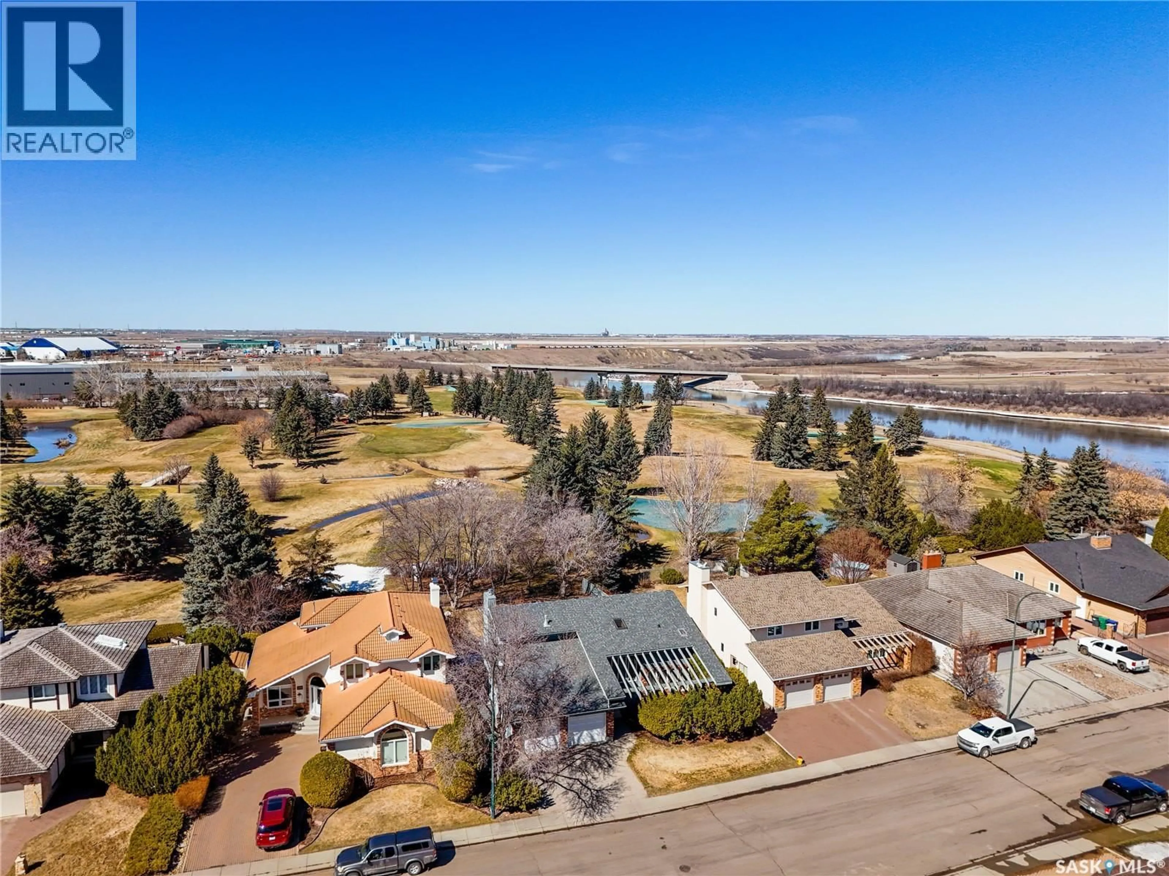 A pic from outside/outdoor area/front of a property/back of a property/a pic from drone, water/lake/river/ocean view for 215 MALLIN CRESCENT, Saskatoon Saskatchewan S7K7X3