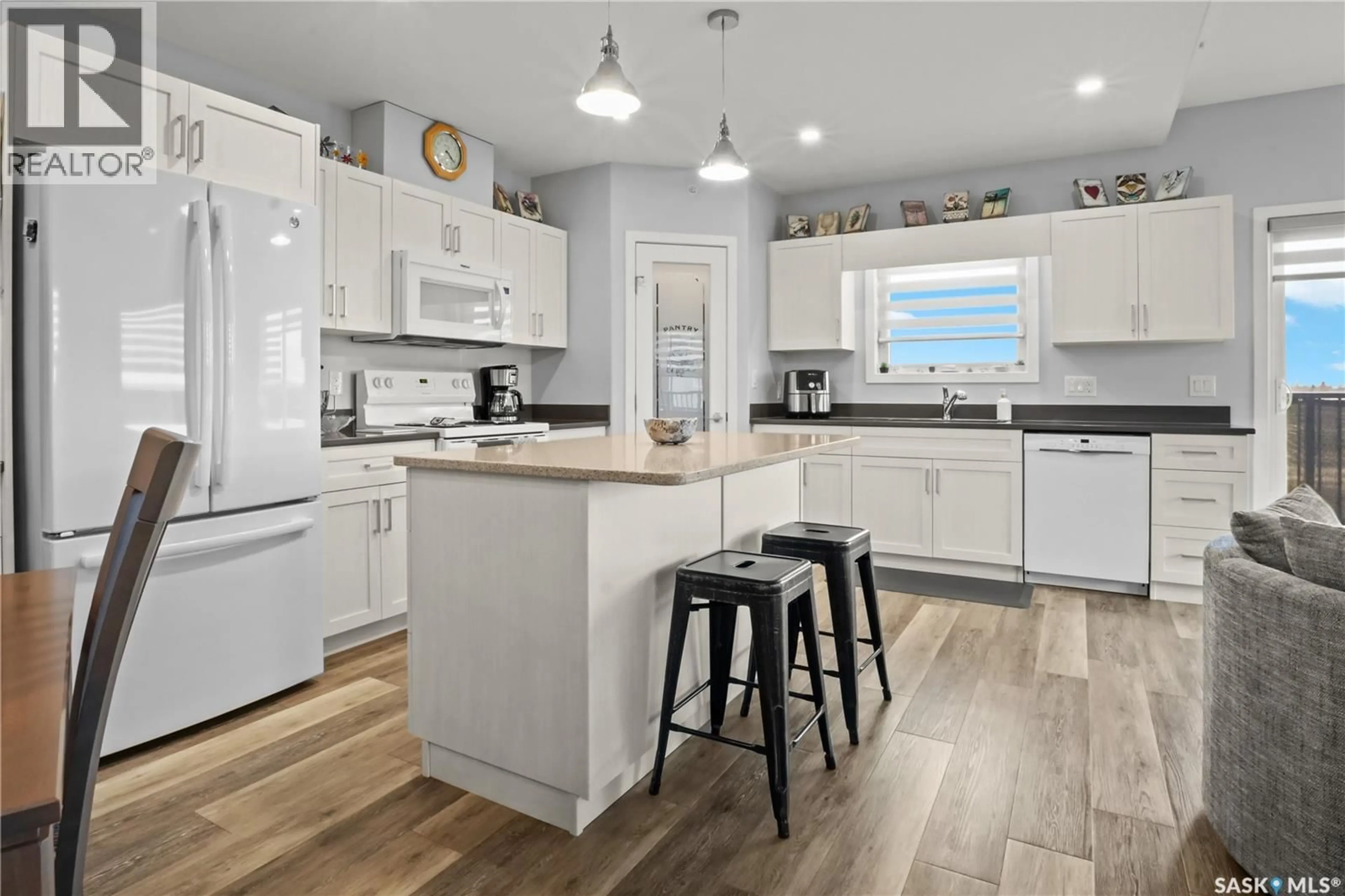 Open concept kitchen, ceramic/tile floor for 304 131 BEAUDRY CRESCENT, Martensville Saskatchewan S0K2T1