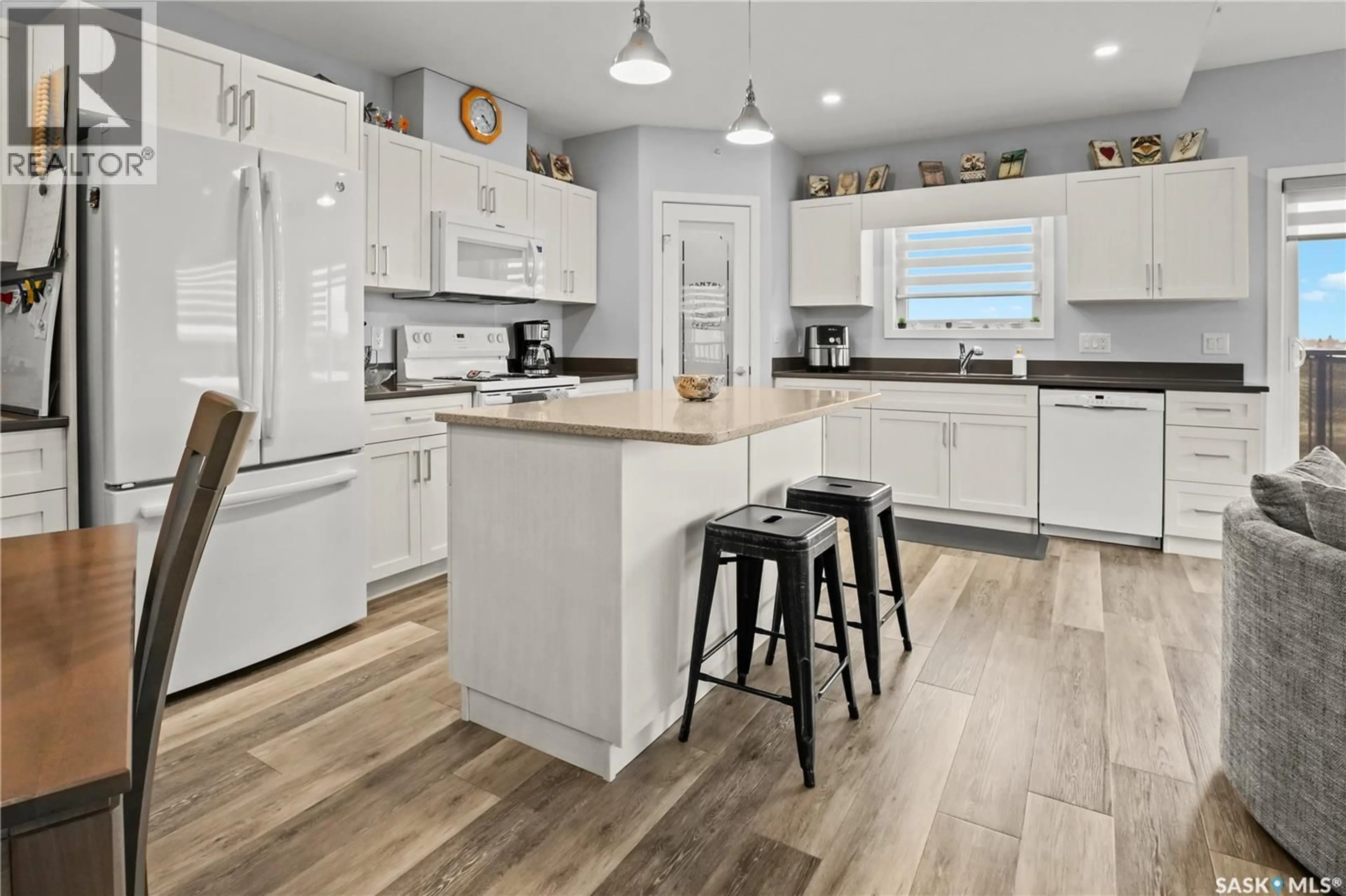 Open concept kitchen, unknown for 304 131 BEAUDRY CRESCENT, Martensville Saskatchewan S0K2T1