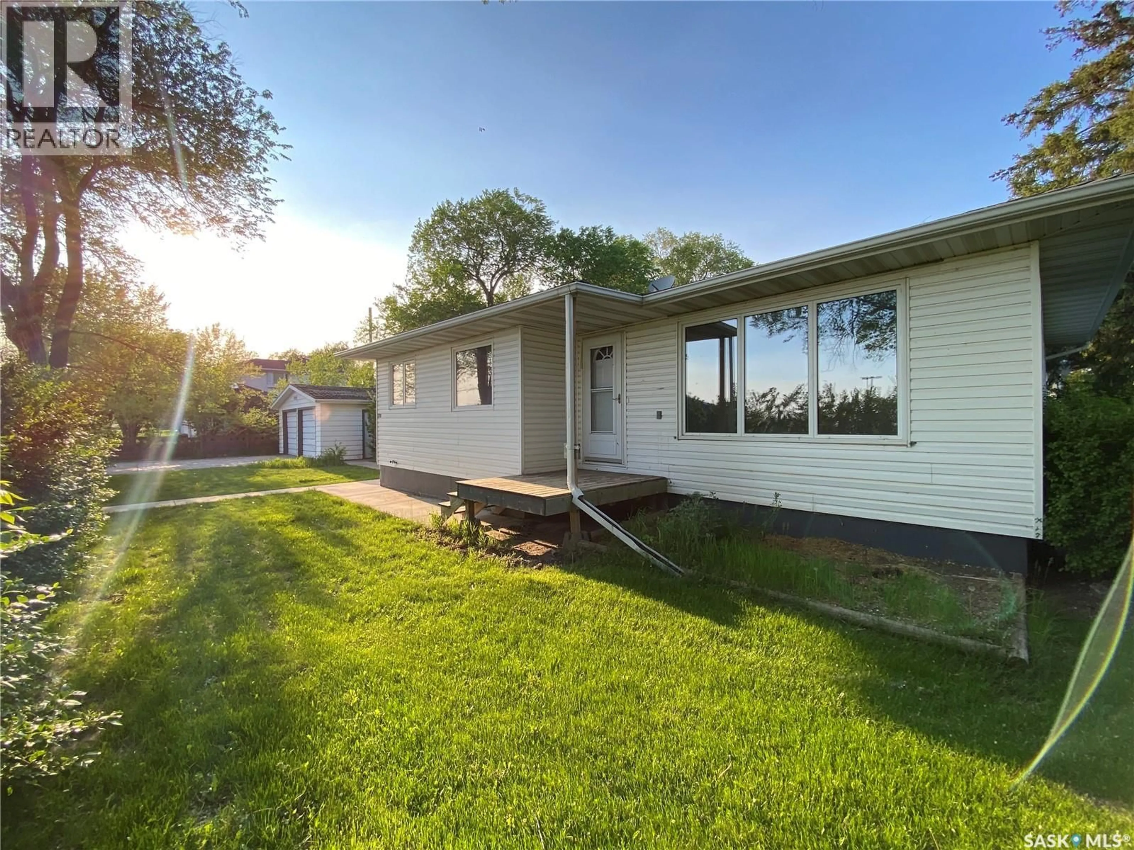 Home with vinyl exterior material, street for E - 320 2 STREET, Carnduff Saskatchewan S0C0S0