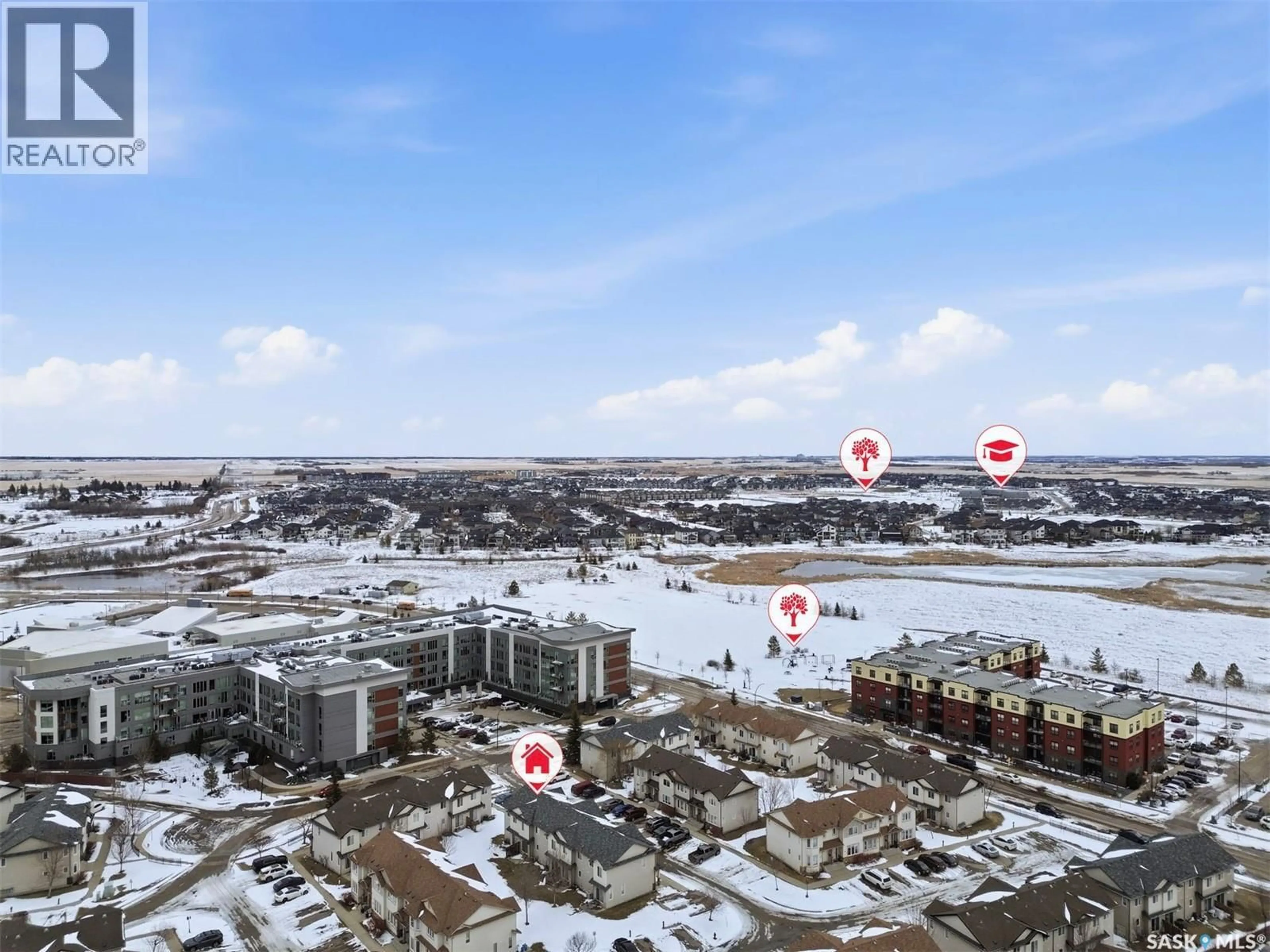 A pic from outside/outdoor area/front of a property/back of a property/a pic from drone, water/lake/river/ocean view for 205 - 303 SLIMMON PLACE, Saskatoon Saskatchewan S7V0A8