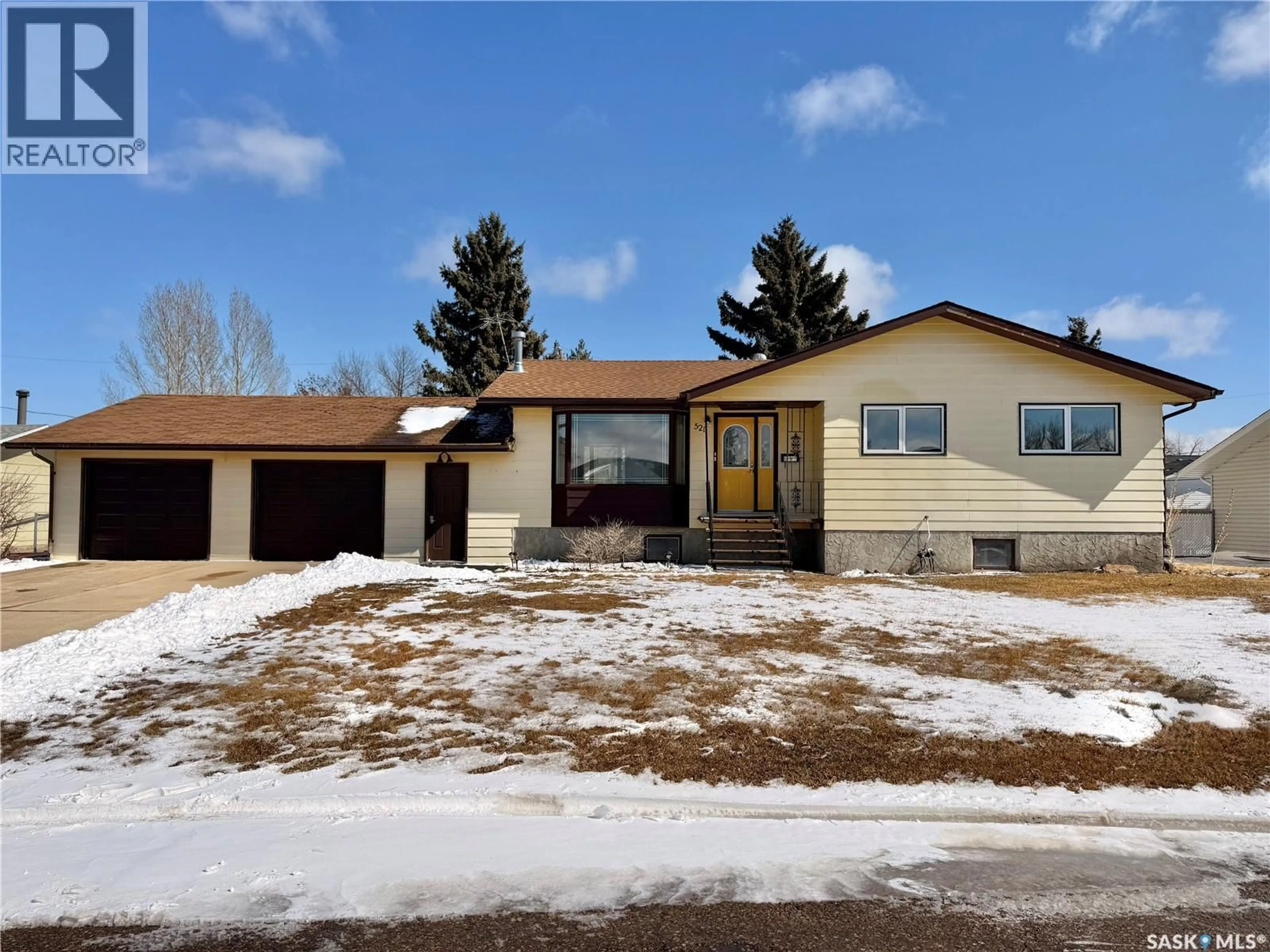 Home with vinyl exterior material, street for 521 HEARN STREET, Outlook Saskatchewan S0L2N0