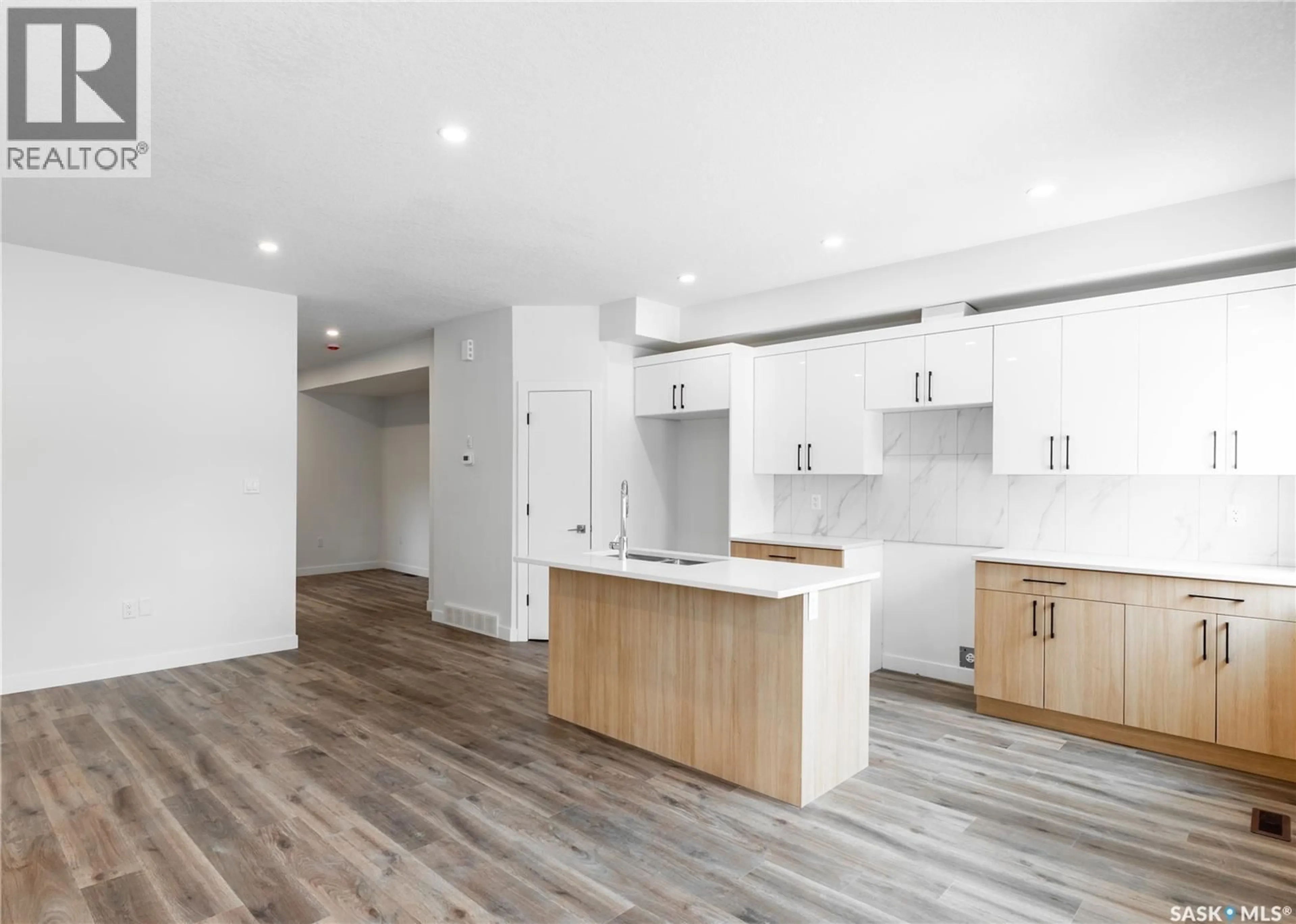 Open concept kitchen, wood/laminate floor for E - 4513 GREEN BROOKS WAY, Regina Saskatchewan S4V3K5