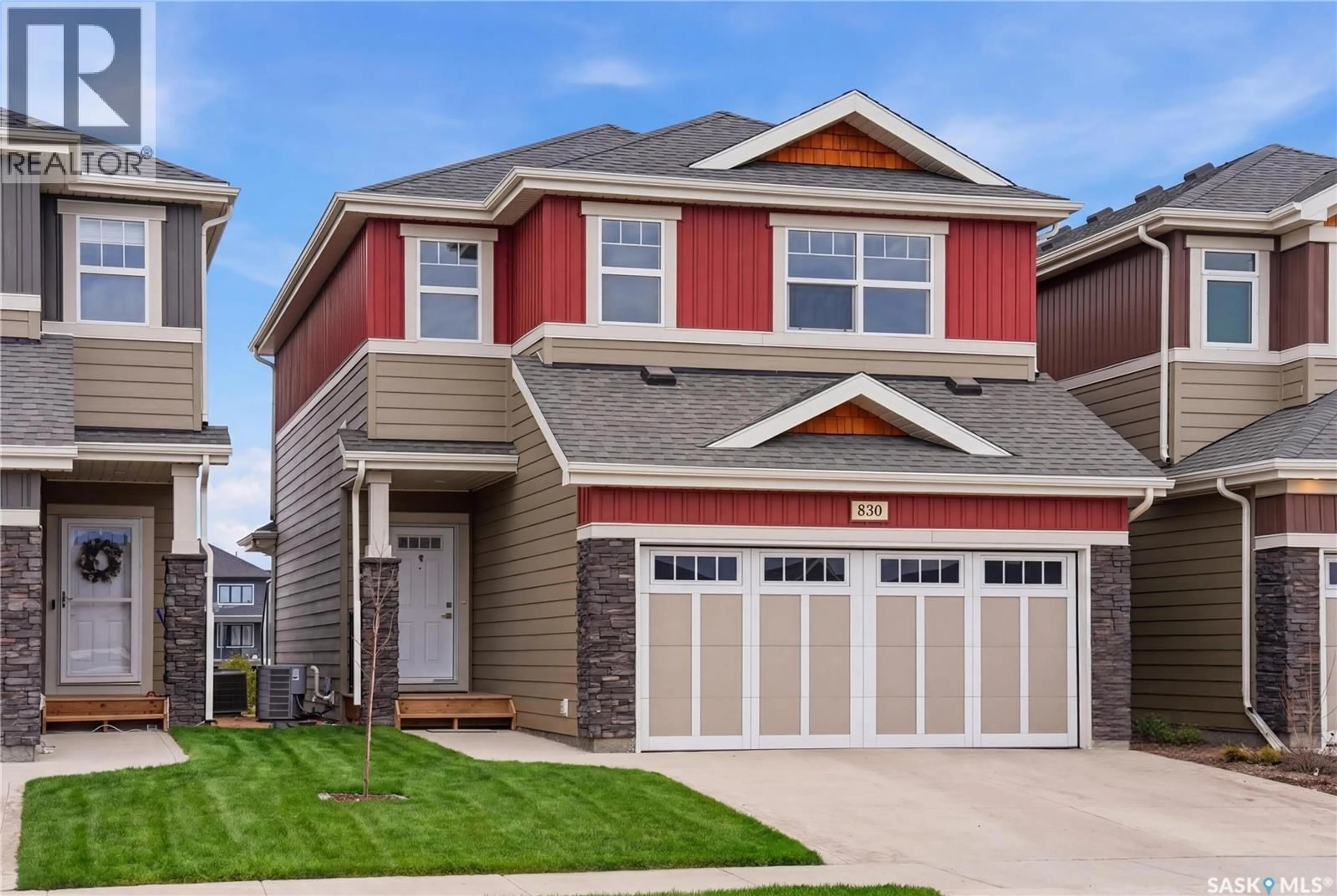 Home with vinyl exterior material, street for 830 KENSINGTON BOULEVARD, Saskatoon Saskatchewan S7L6N5