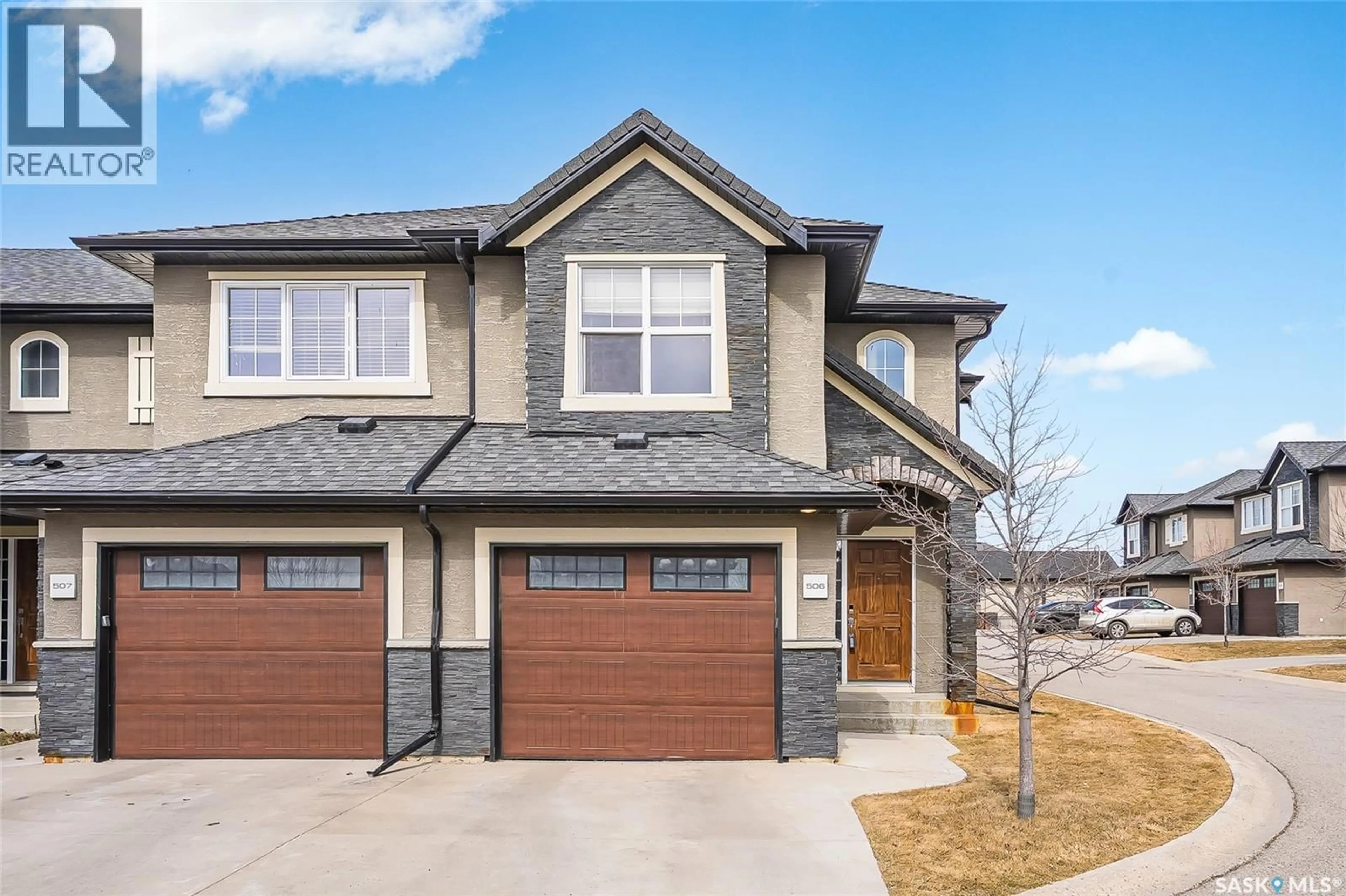 Home with brick exterior material, street for 506 455 REMPEL LANE, Saskatoon Saskatchewan S7T0R8