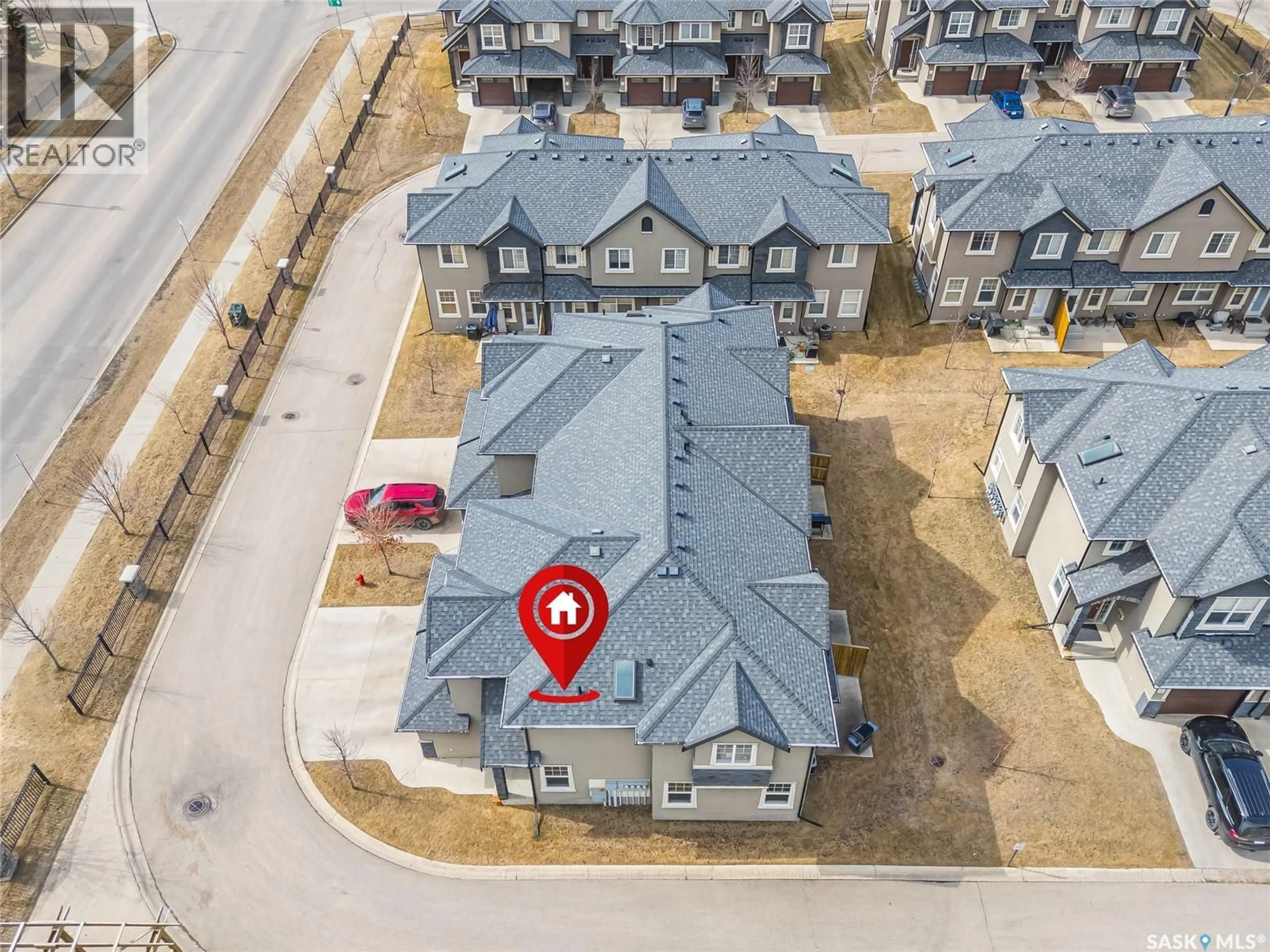 A pic from outside/outdoor area/front of a property/back of a property/a pic from drone, street for 506 455 REMPEL LANE, Saskatoon Saskatchewan S7T0R8