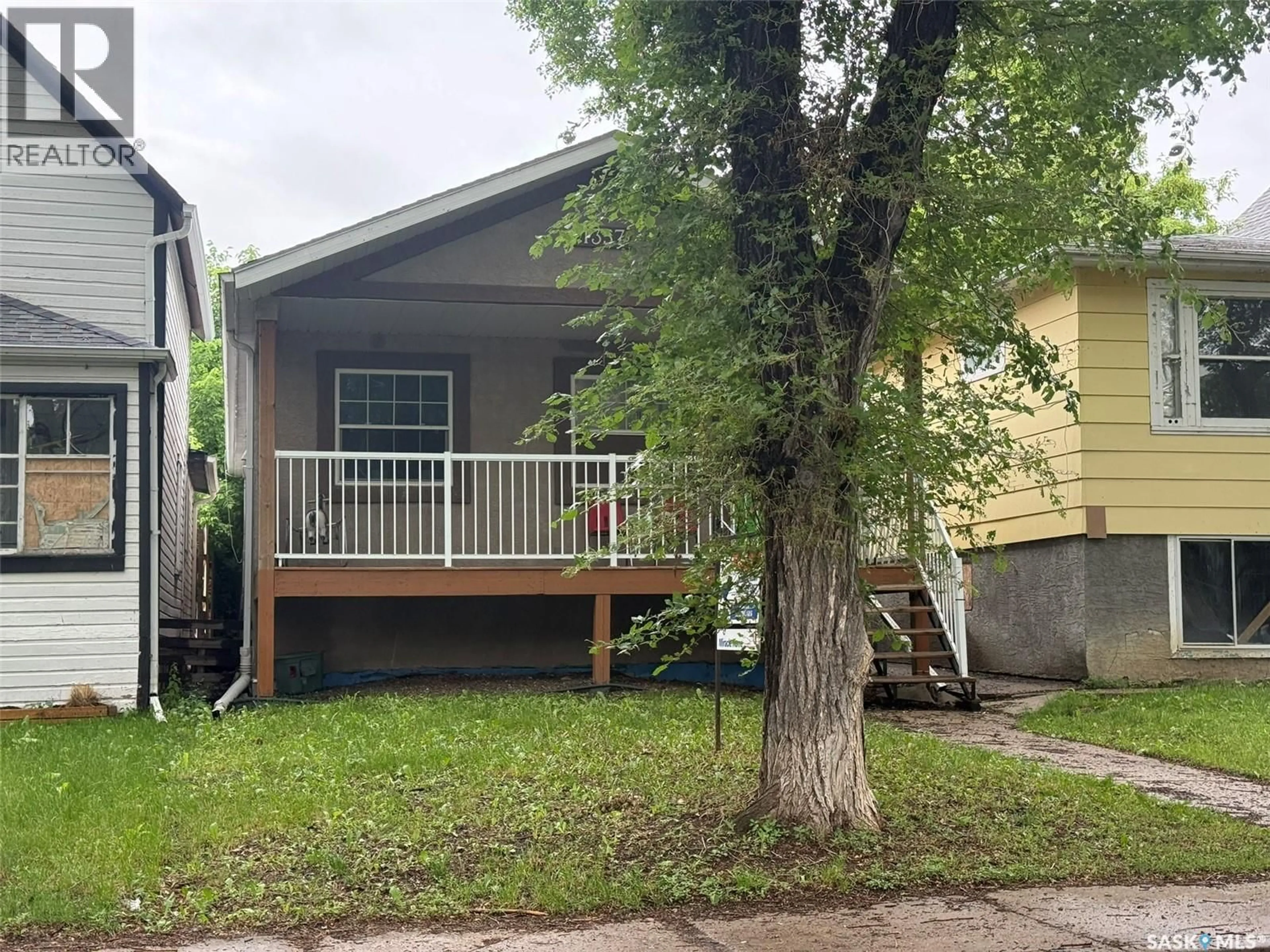 Home with vinyl exterior material, street for 1357 RAE STREET, Regina Saskatchewan S4T2C4