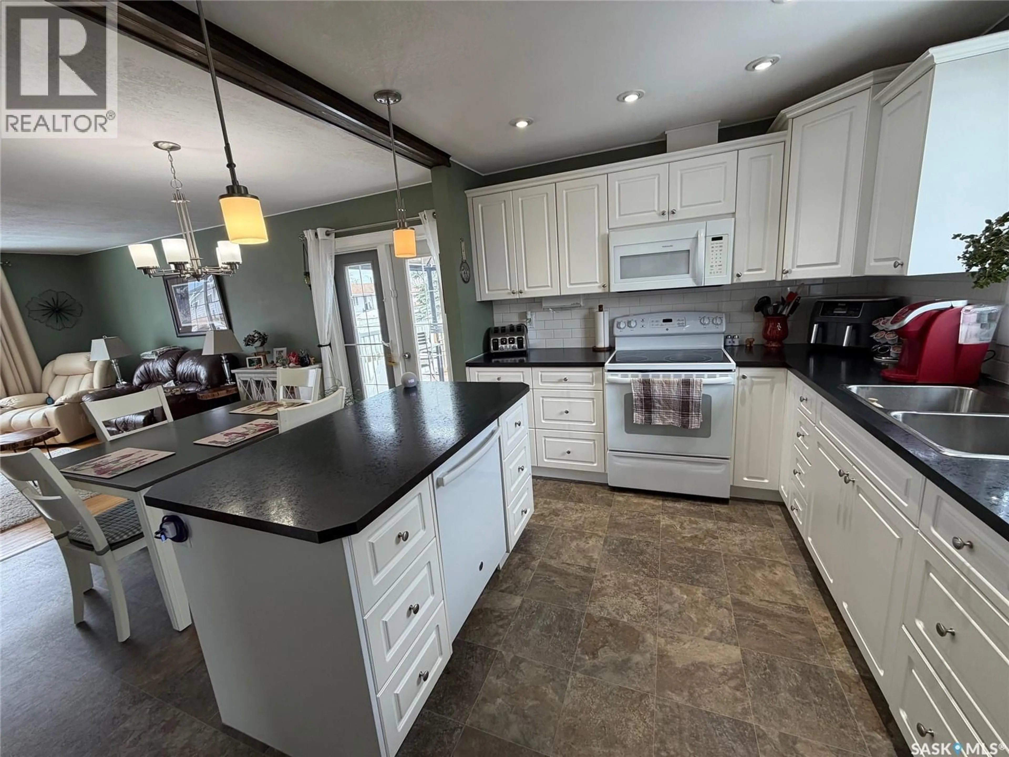Open concept kitchen, ceramic/tile floor for 739 HUDSON CRESCENT, Hudson Bay Saskatchewan S0E0Y0