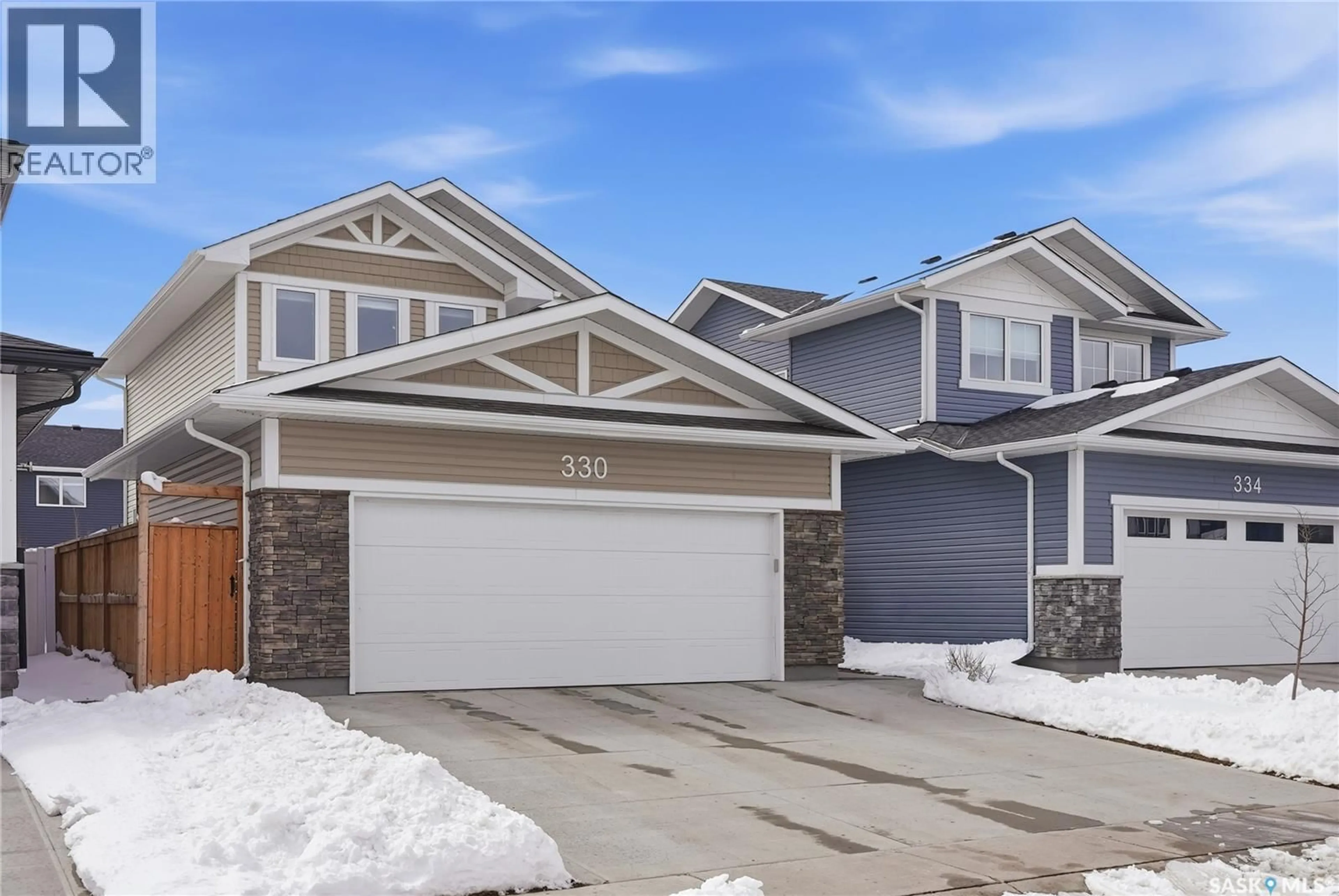 Home with vinyl exterior material, street for 330 GERMAIN MANOR, Saskatoon Saskatchewan S7V0T7