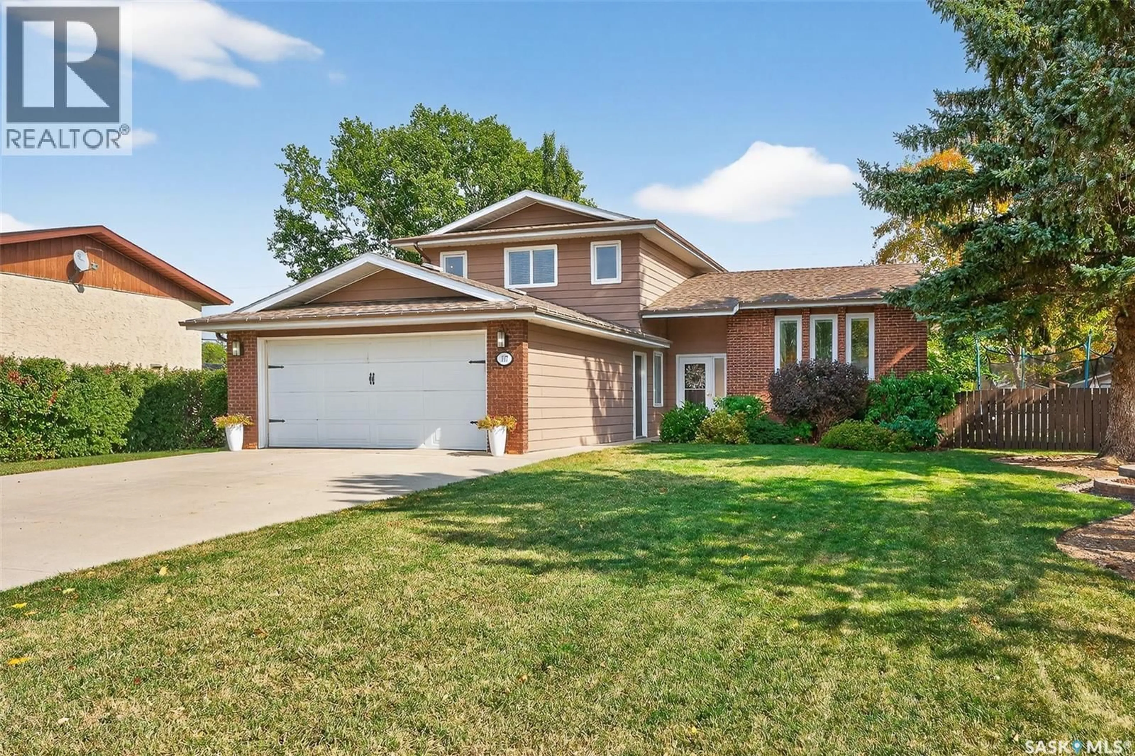 Home with brick exterior material, street for 107 COTTONWOOD STREET, Caronport Saskatchewan S0H0S0