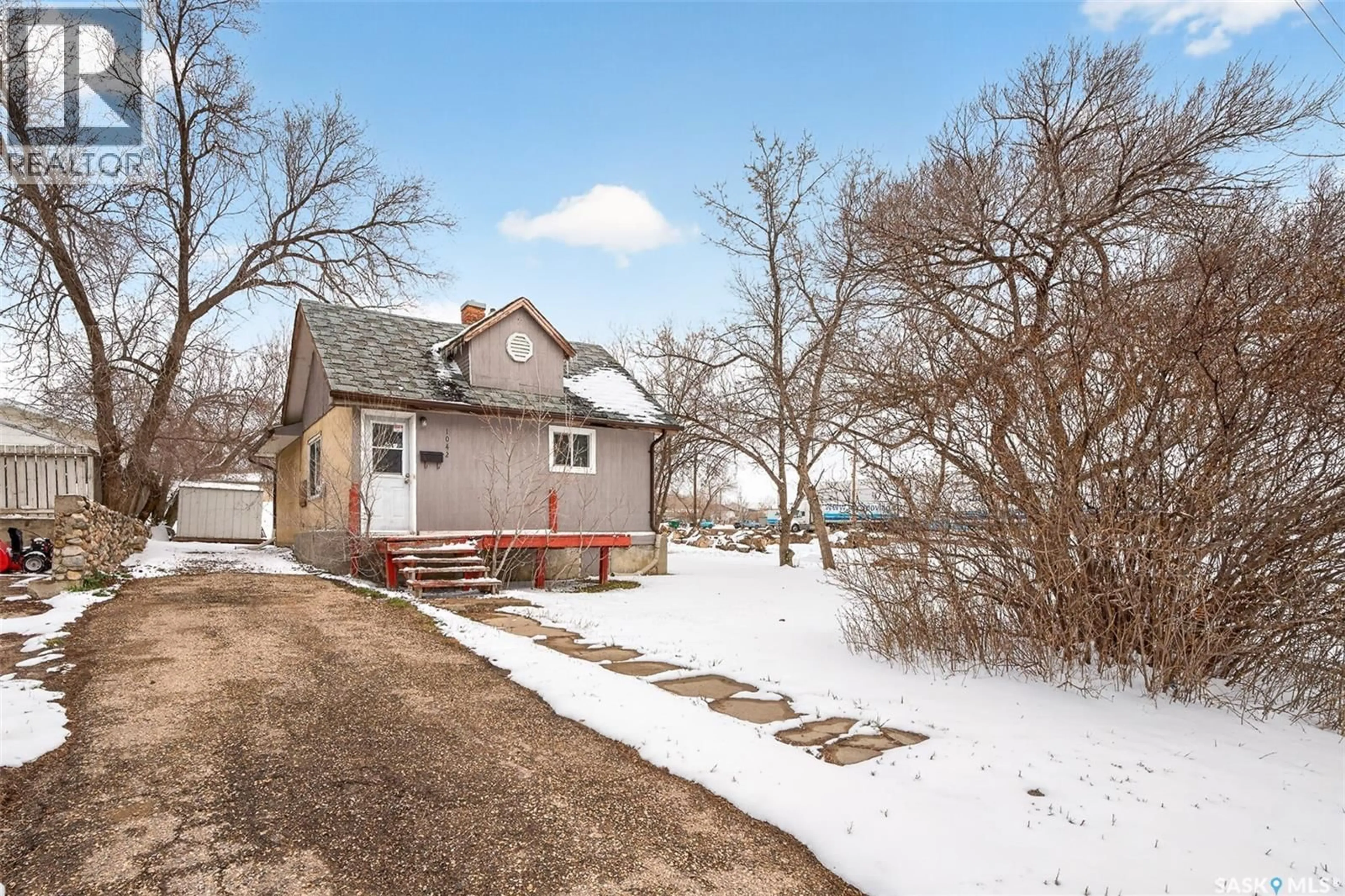 A pic from outside/outdoor area/front of a property/back of a property/a pic from drone, street for 1042 FAIRFORD STREET, Moose Jaw Saskatchewan S6H0G6
