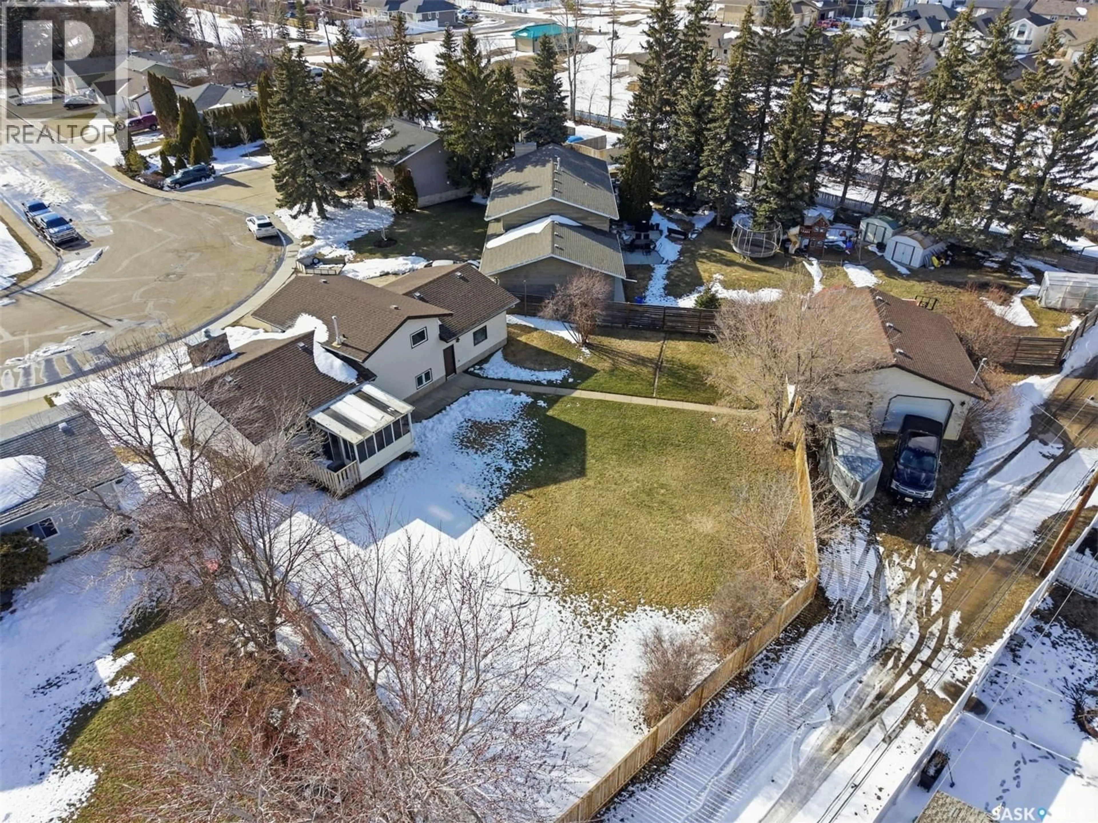 A pic from outside/outdoor area/front of a property/back of a property/a pic from drone, street for 516 WILKEN CRESCENT, Warman Saskatchewan S0K5S0