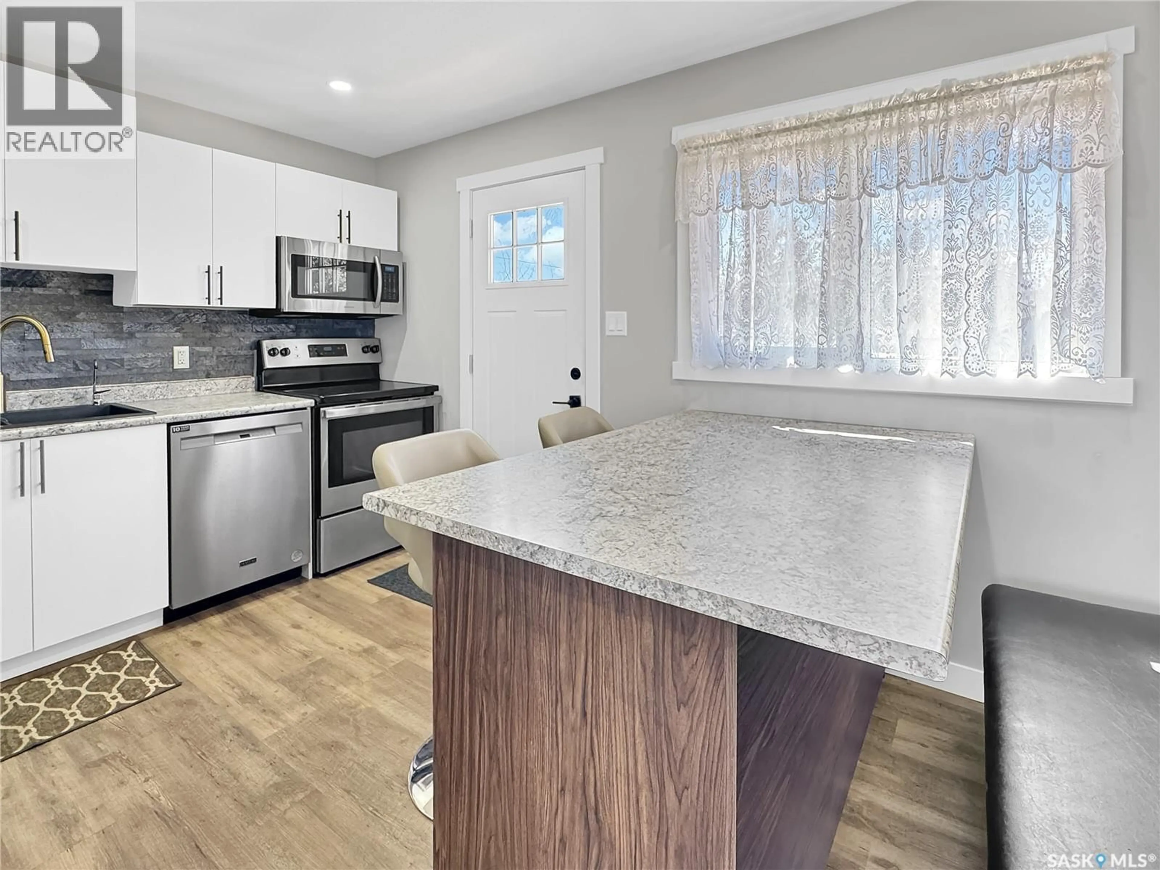 Open concept kitchen, unknown for 351 33RD STREET, Battleford Saskatchewan S0M0E0