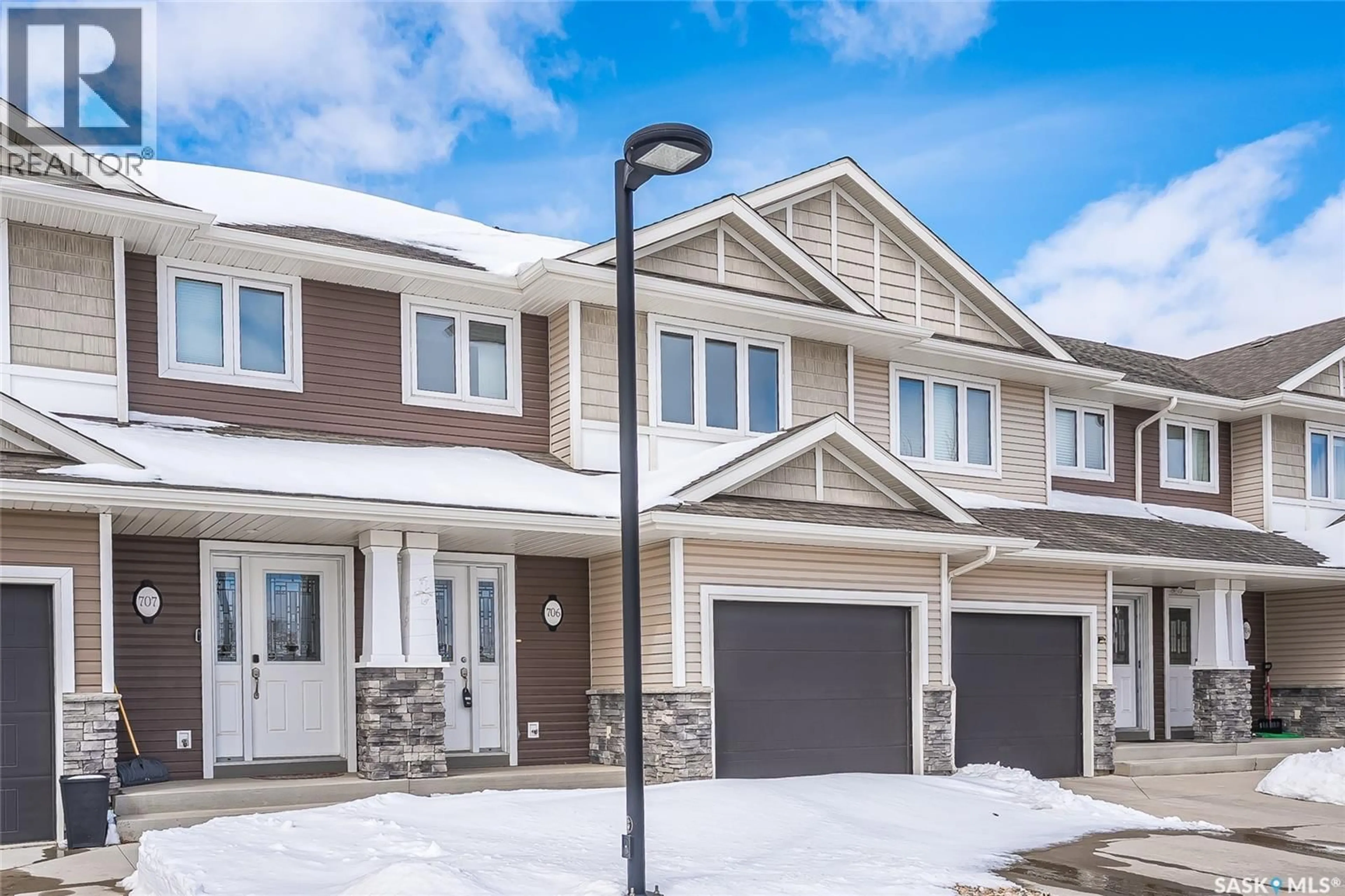 Home with vinyl exterior material, street for 706 250 PALLISER COURT, Saskatoon Saskatchewan S7L4Y6