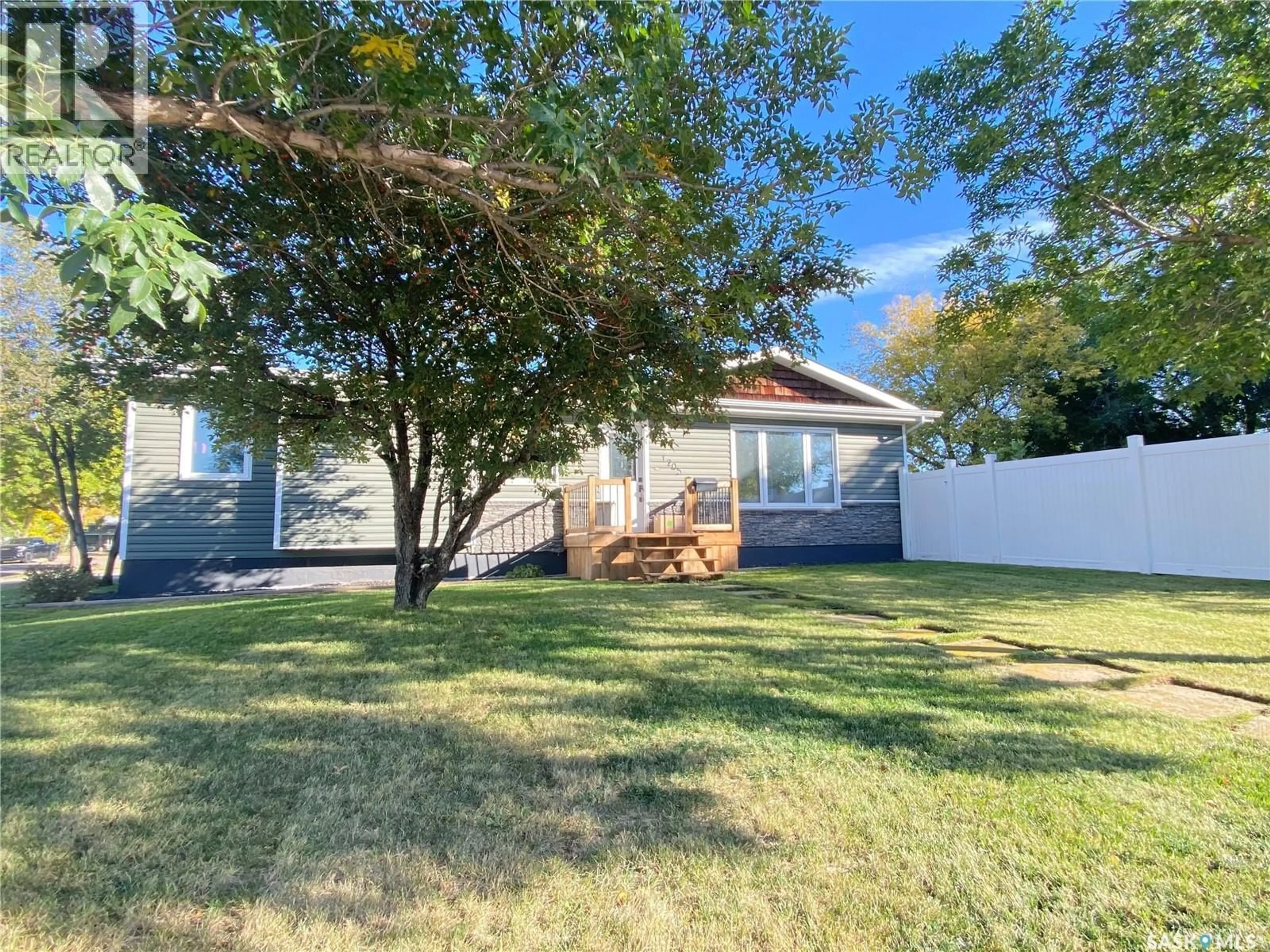 A pic from outside/outdoor area/front of a property/back of a property/a pic from drone, street for 1205 DOUGLAS ROAD, Weyburn Saskatchewan S4H2P9