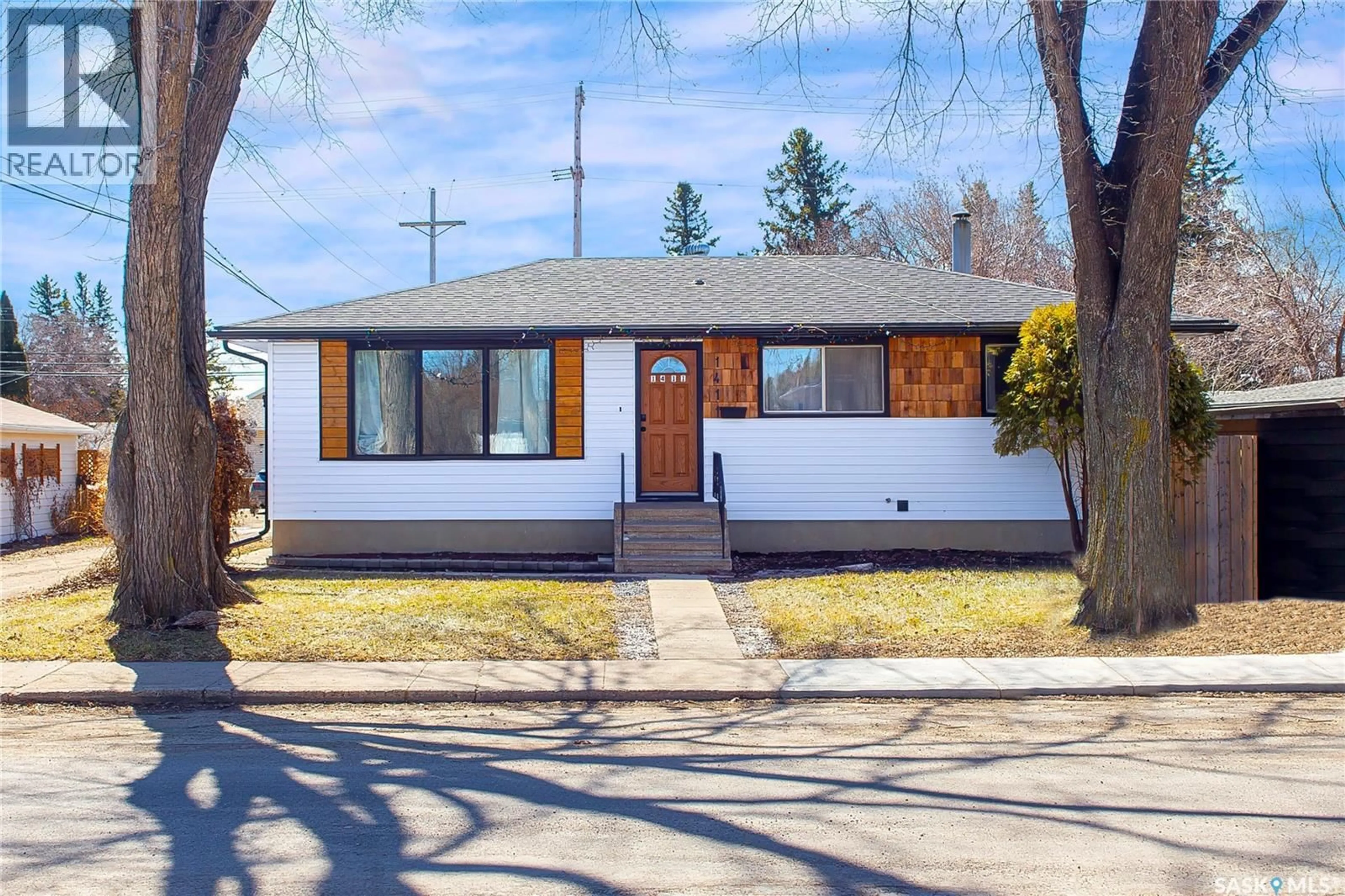 Home with brick exterior material, street for 1411 DONALD STREET, Saskatoon Saskatchewan S7W3R6