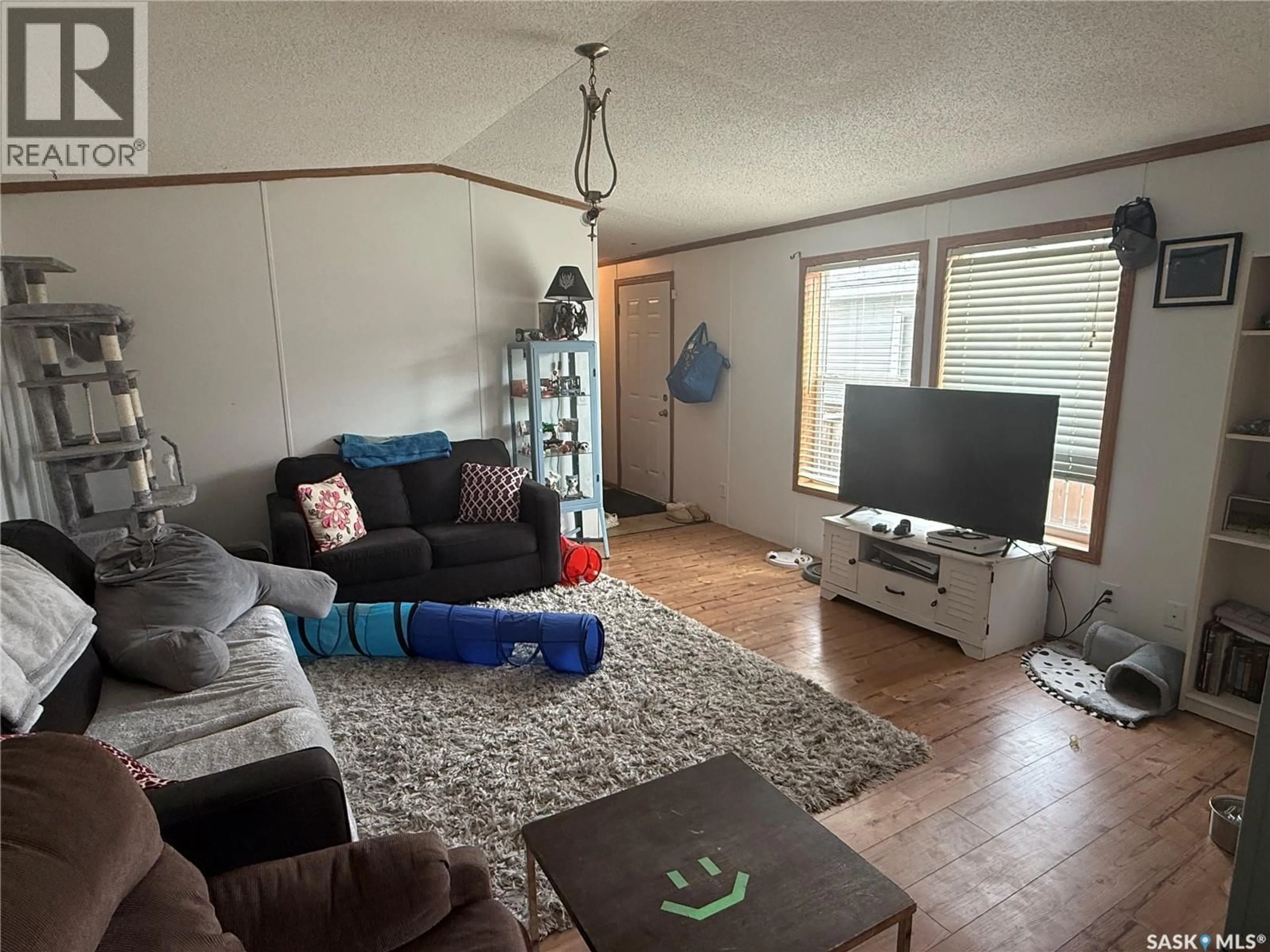 Living room with furniture, unknown for 106 - 48 1ST AVENUE, Weyburn Saskatchewan S4H2J1