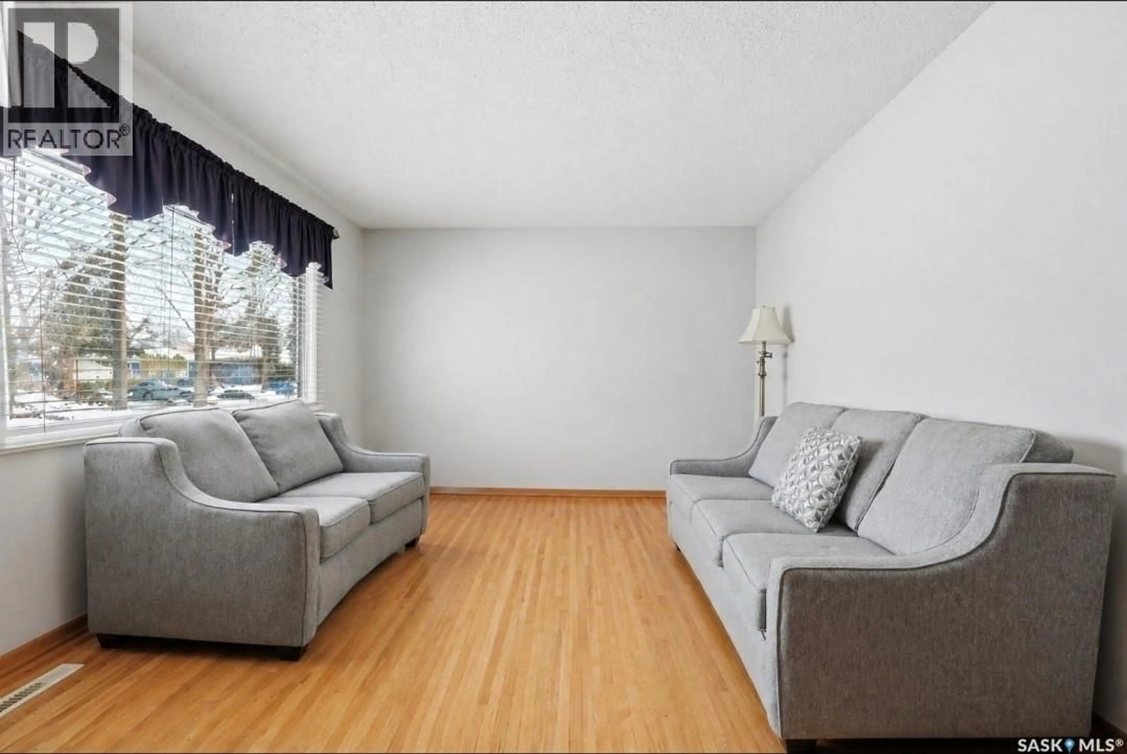 Living room with furniture, unknown for 51 MCASKILL CRESCENT, Saskatoon Saskatchewan S7J3K1