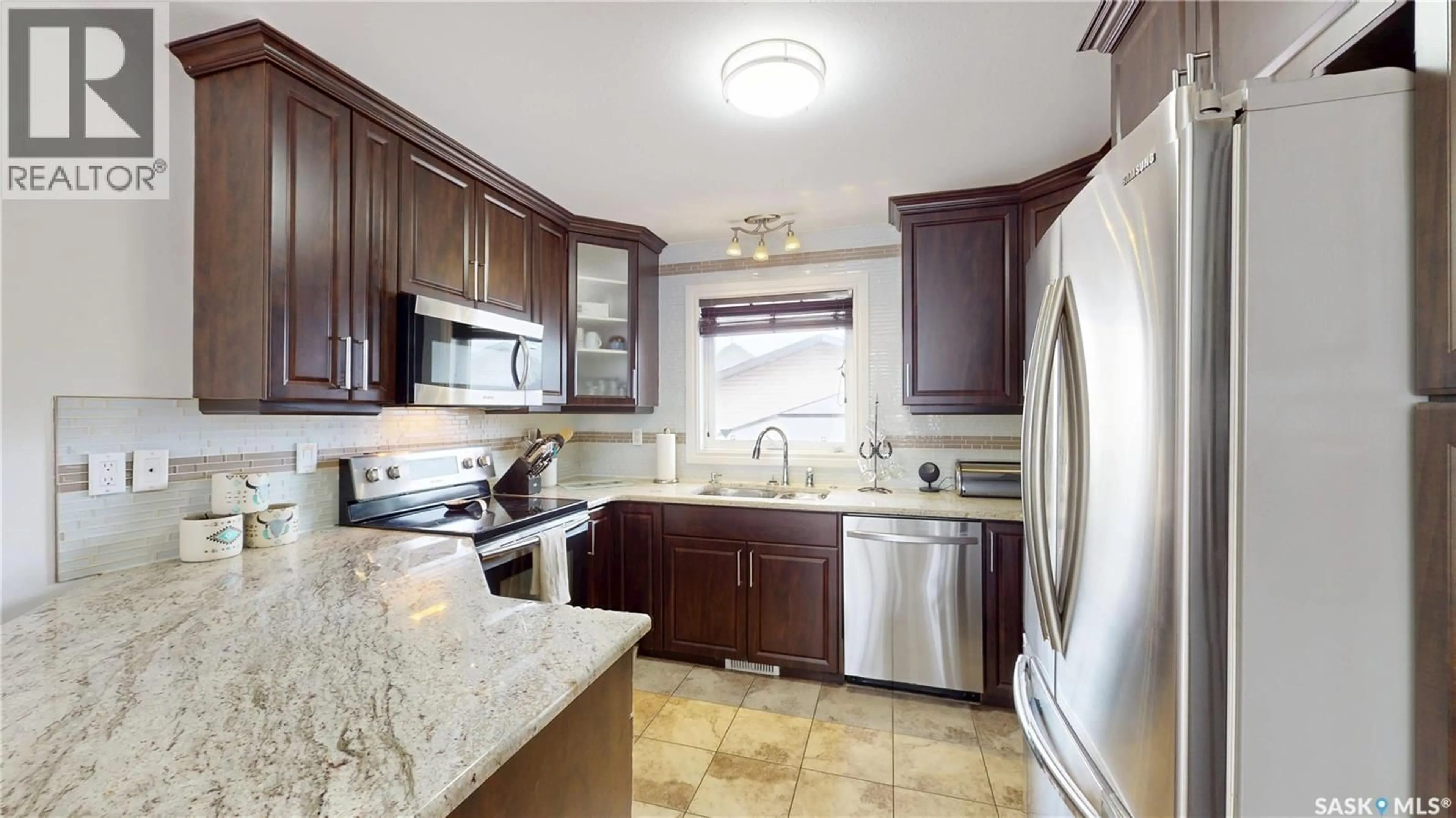 Standard kitchen, ceramic/tile floor for 747 RUTHERFORD LANE, Saskatoon Saskatchewan S7N4X6