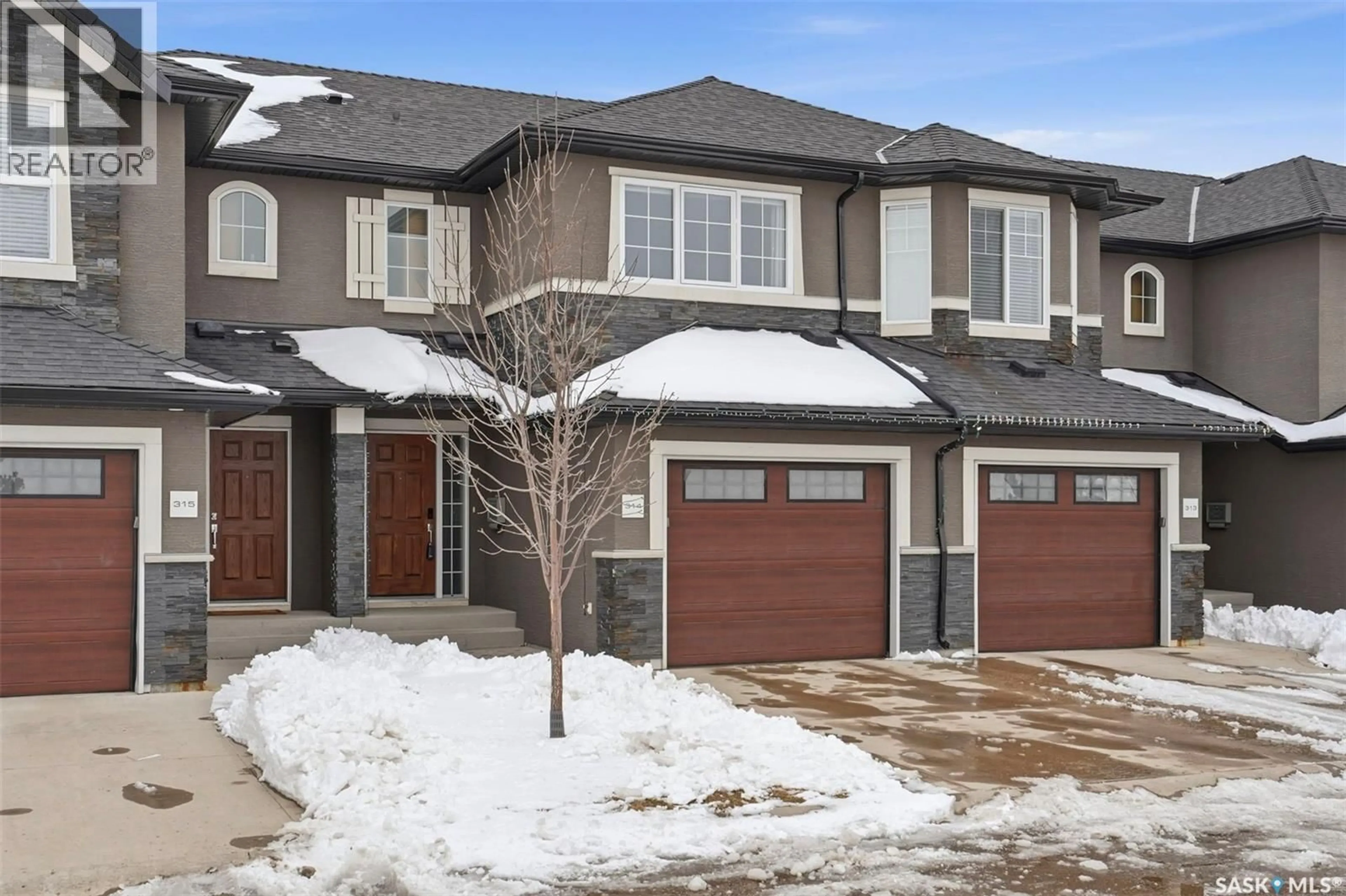 Home with brick exterior material, street for 1303 - 314 PATON CRESCENT, Saskatoon Saskatchewan S7W0P6