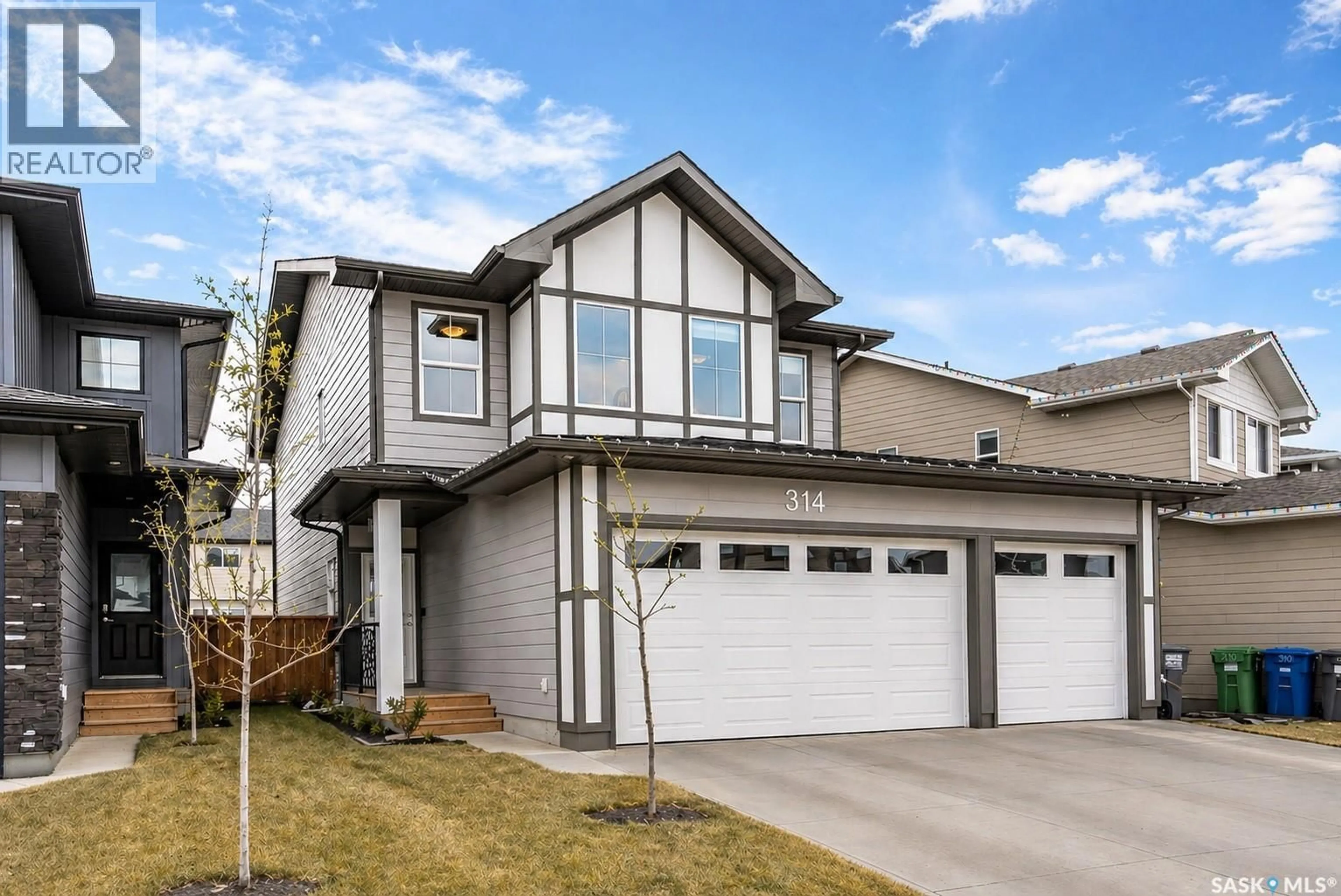 Home with vinyl exterior material, street for 314 KEITH UNION, Saskatoon Saskatchewan S7V0X8