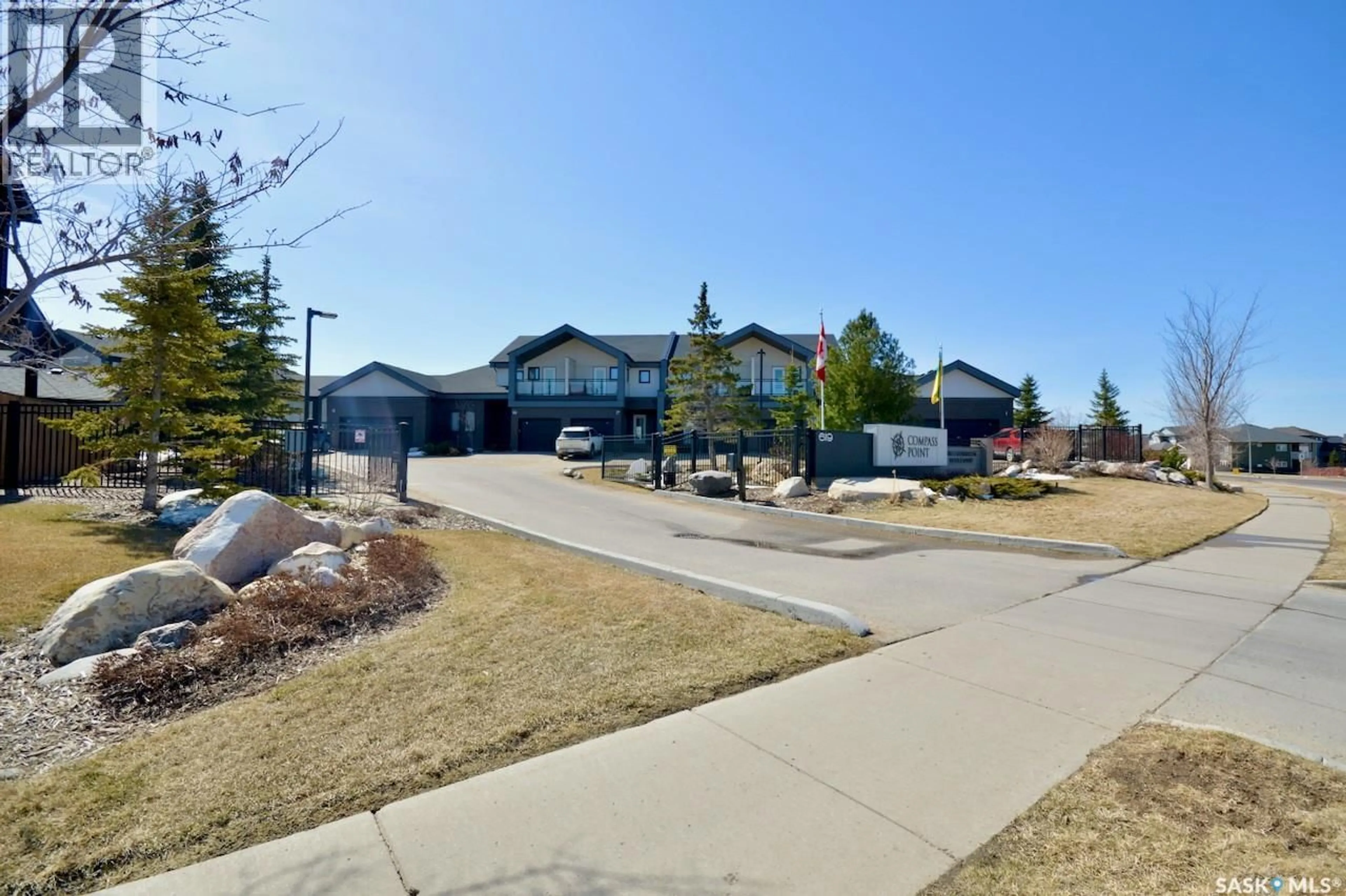 A pic from outside/outdoor area/front of a property/back of a property/a pic from drone, street for 73 619 EVERGREEN BOULEVARD, Saskatoon Saskatchewan S7W0Y8