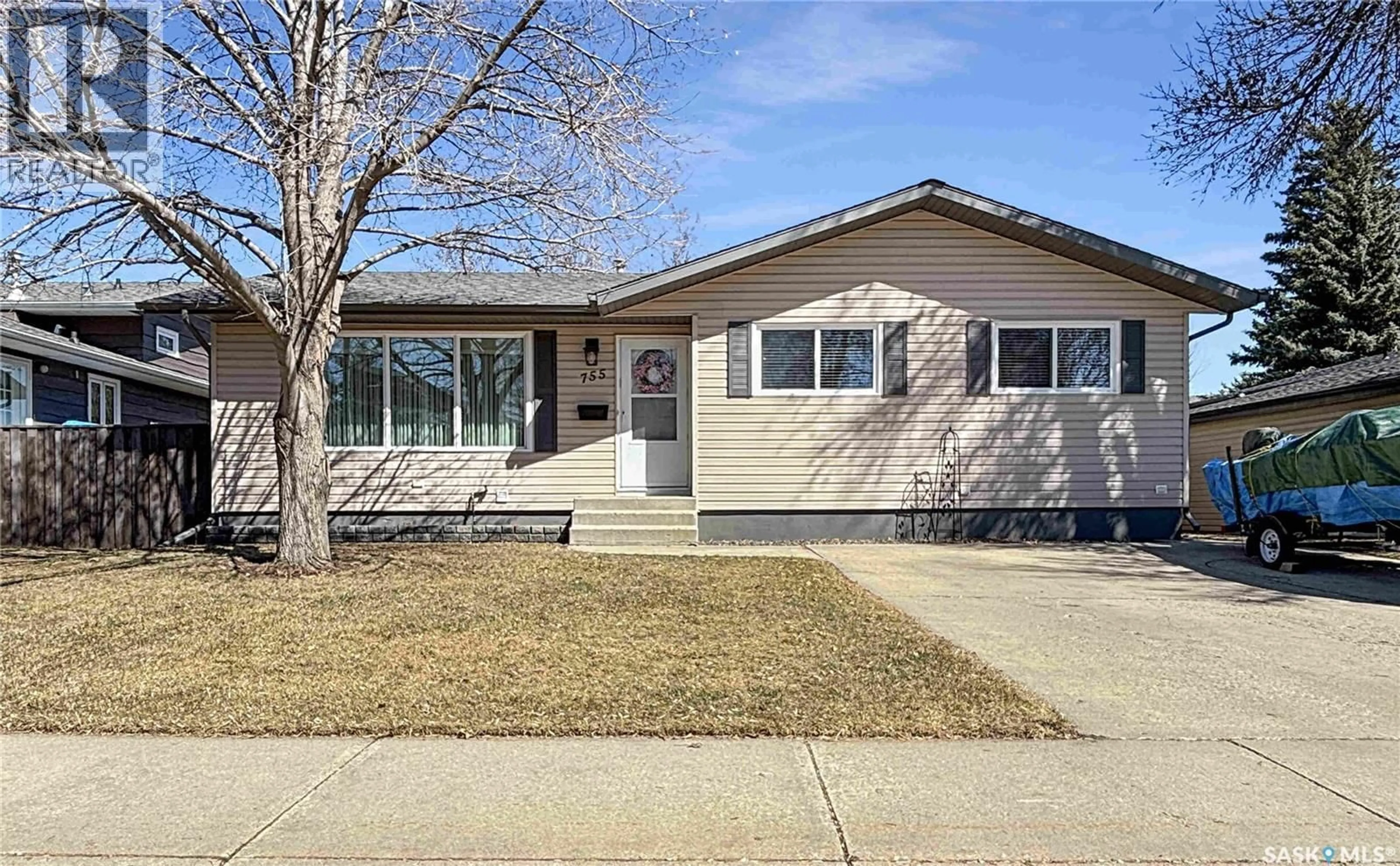 Home with vinyl exterior material, street for 755 TOBIN TERRACE, Saskatoon Saskatchewan S7K4P4