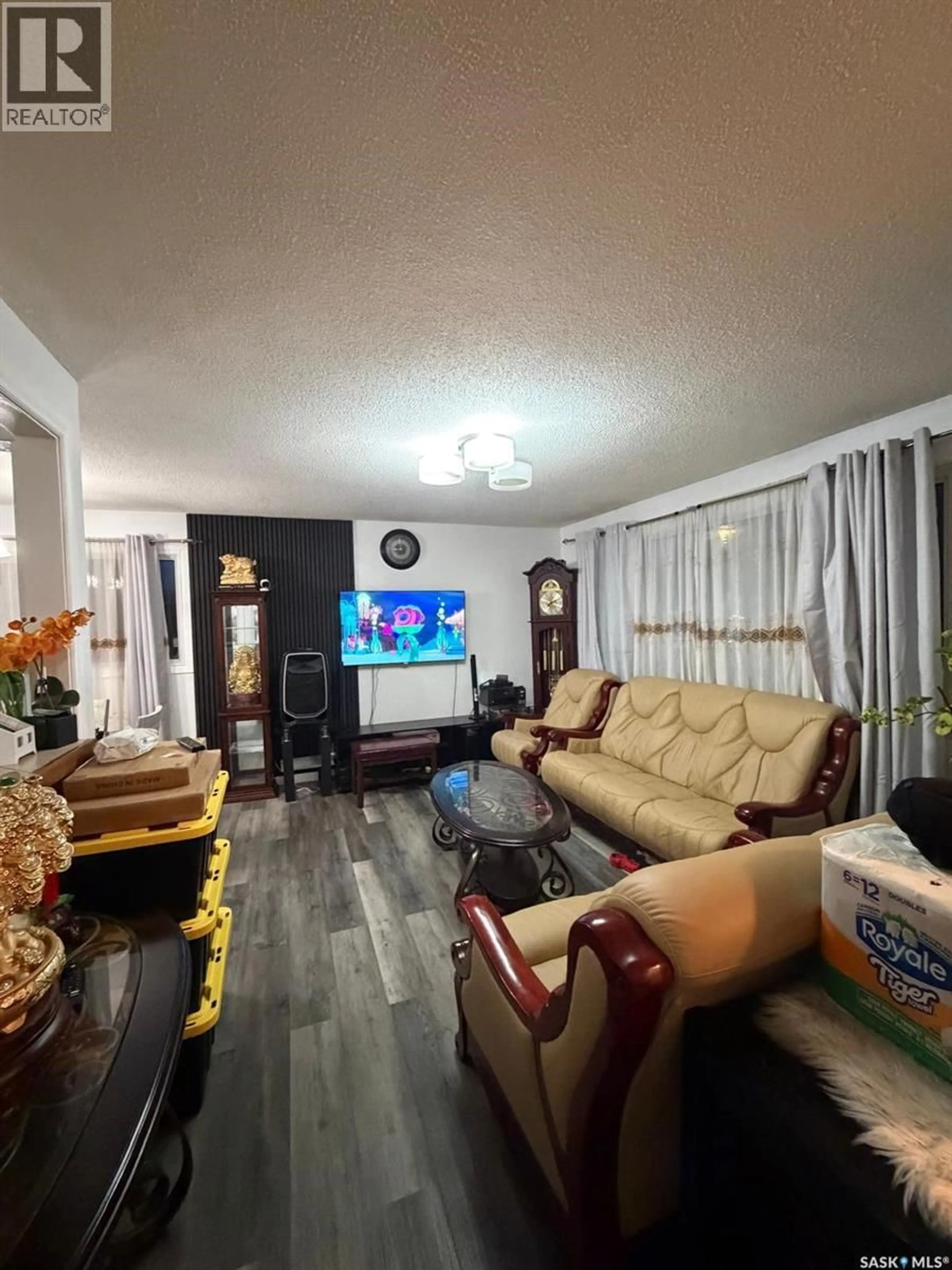 Living room with furniture, unknown for 306 X AVENUE, Saskatoon Saskatchewan S7L3J7
