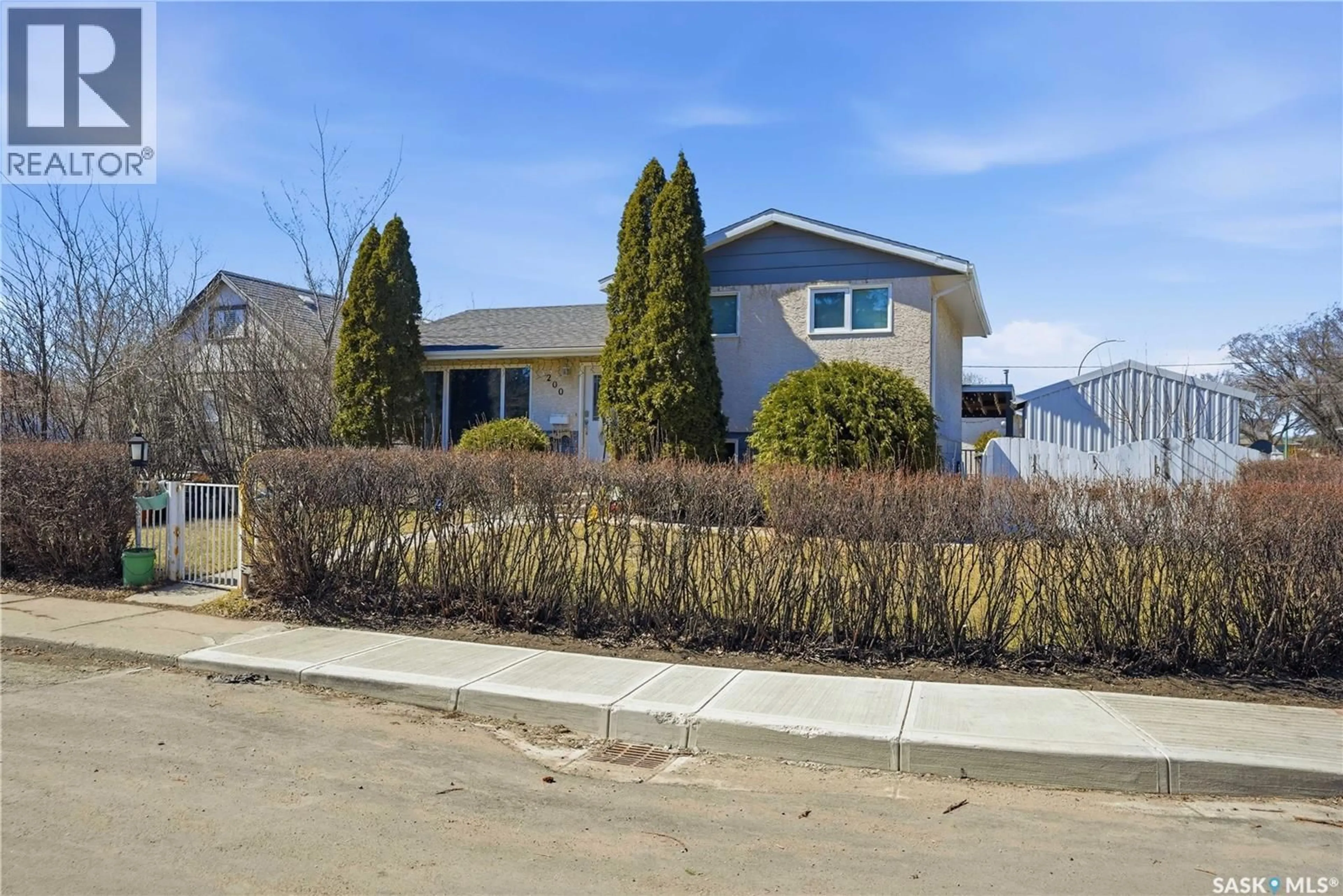 Home with vinyl exterior material, street for 200 HALIFAX STREET, Regina Saskatchewan S4R1S4