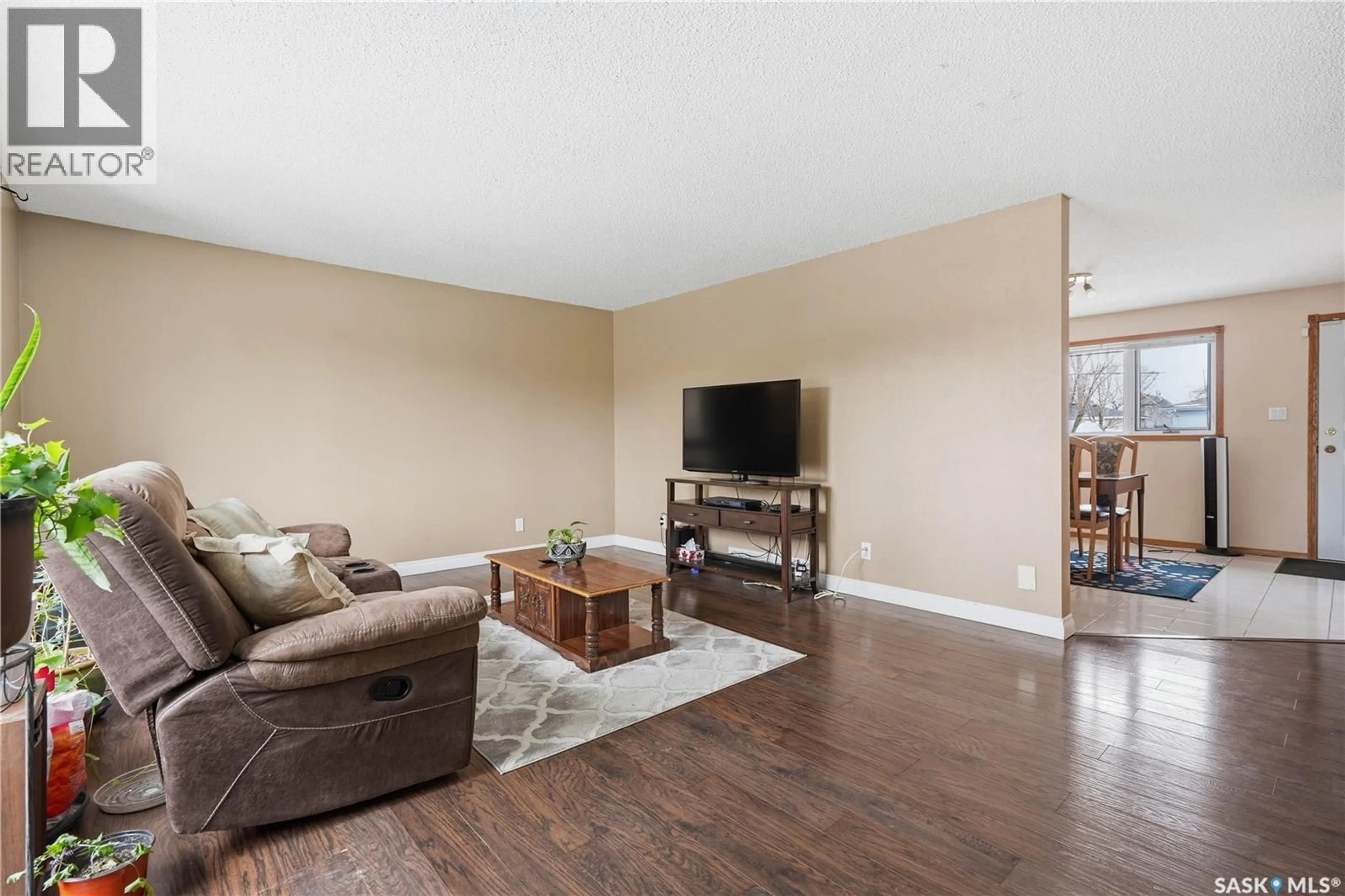 Living room with furniture, wood/laminate floor for 200 HALIFAX STREET, Regina Saskatchewan S4R1S4