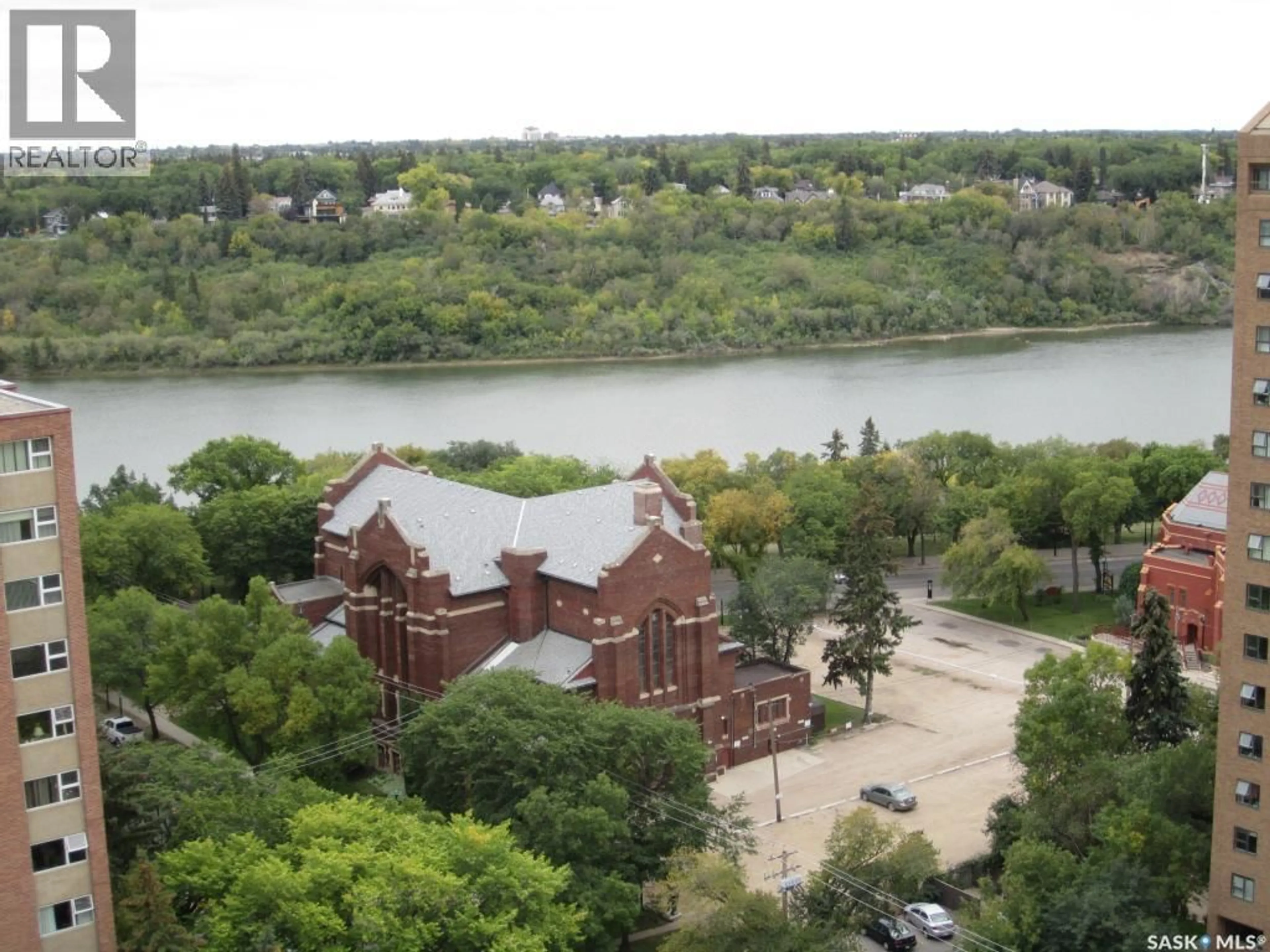 A pic from outside/outdoor area/front of a property/back of a property/a pic from drone, water/lake/river/ocean view for 1907 311 6TH AVENUE, Saskatoon Saskatchewan S7K7A9