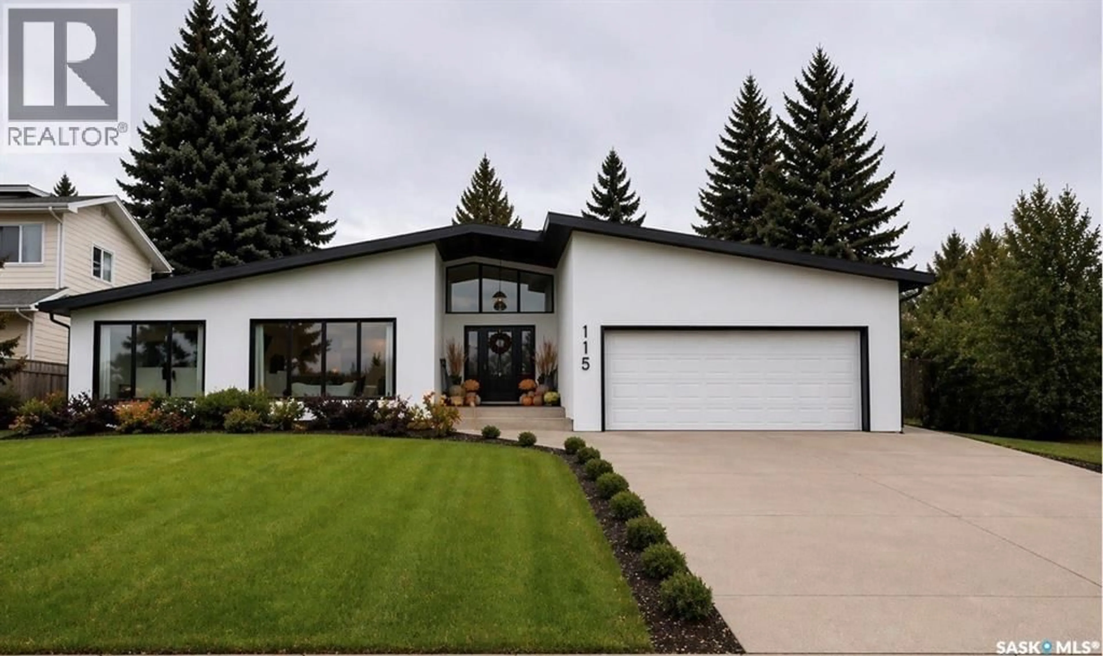 Home with vinyl exterior material, street for 115 WHITESWAN DRIVE, Saskatoon Saskatchewan S7K4M5