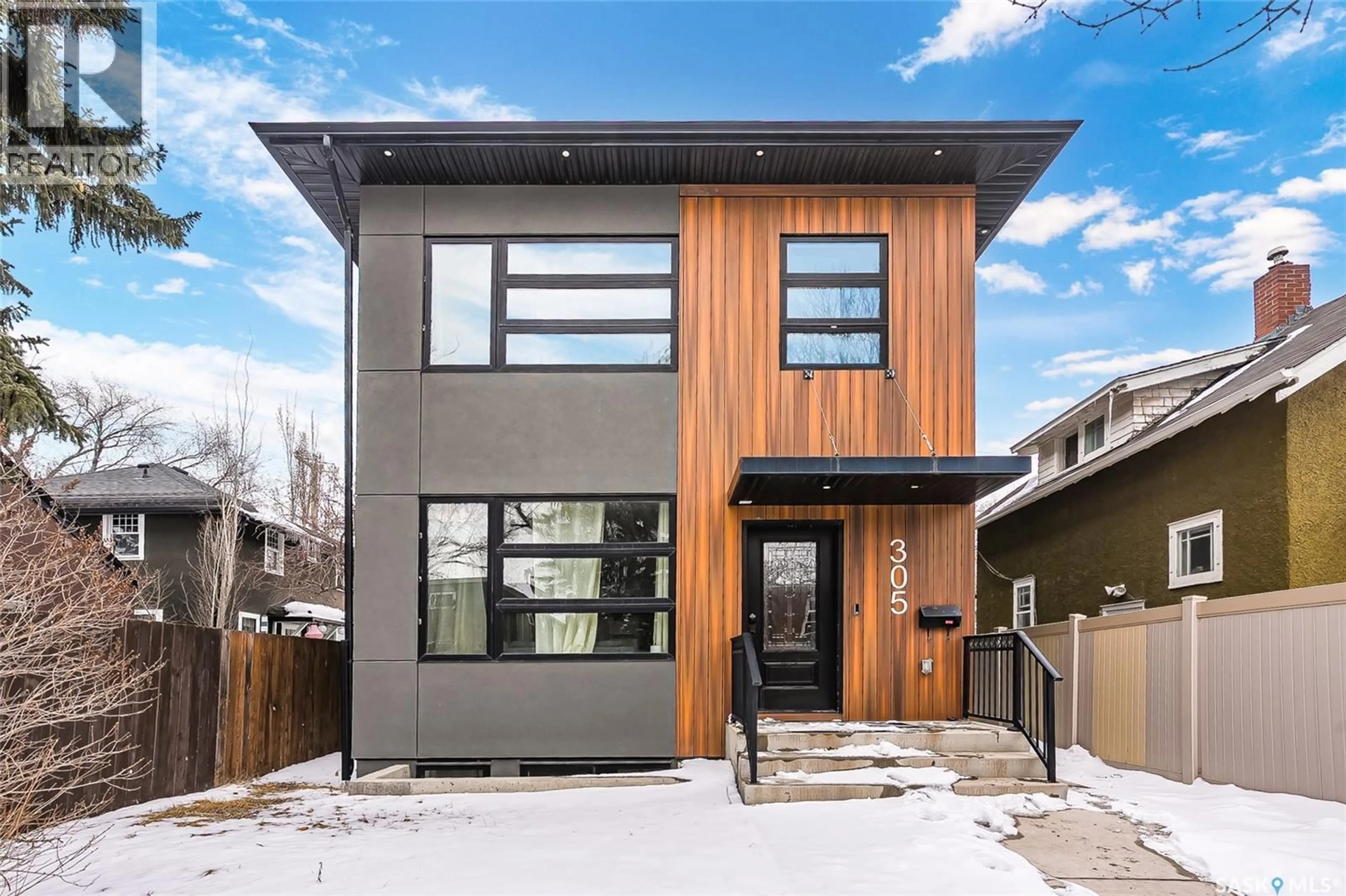 Home with brick exterior material, street for 305 CLARENCE AVENUE, Saskatoon Saskatchewan S7N1H5