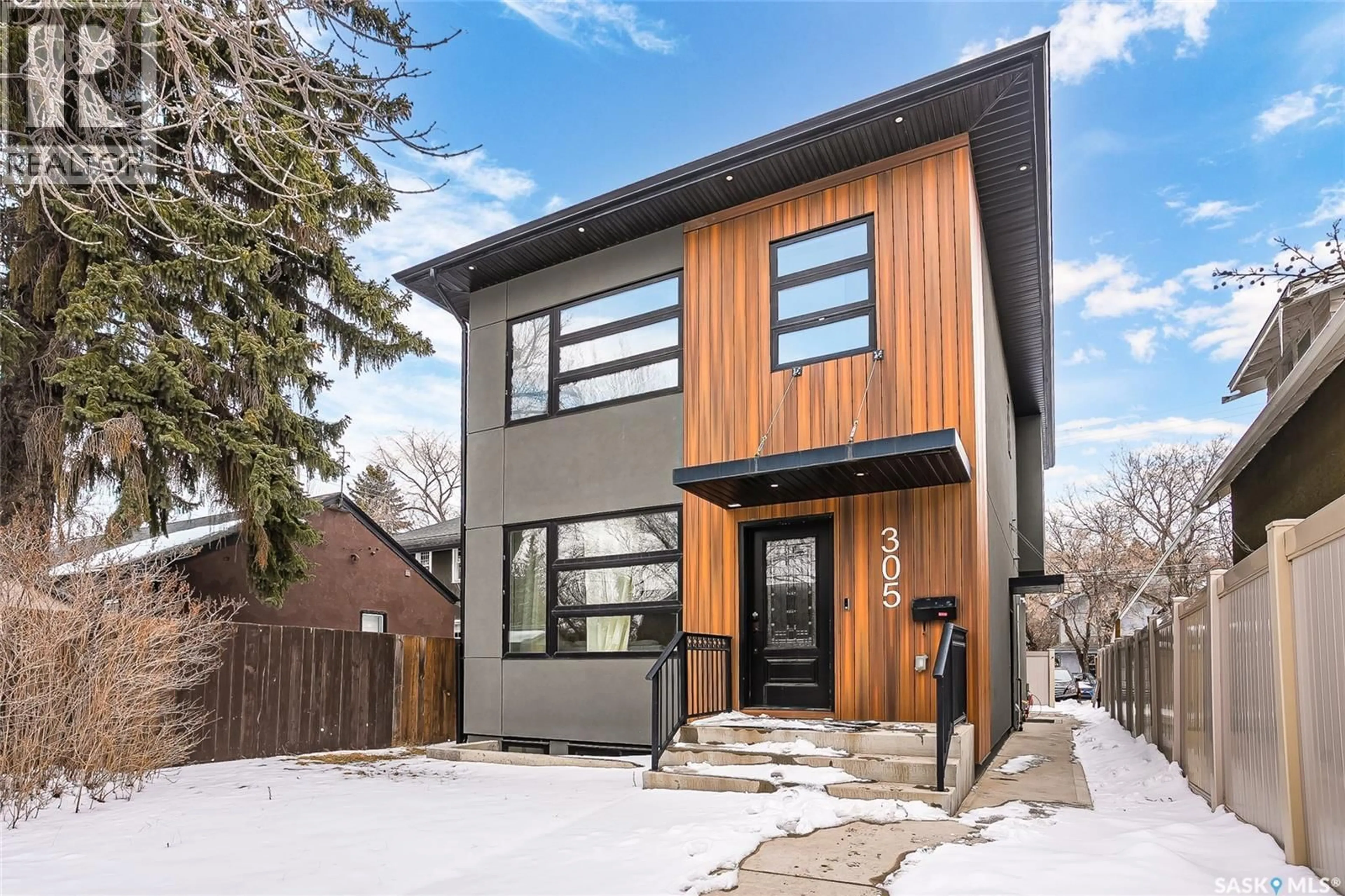 Home with brick exterior material, street for 305 CLARENCE AVENUE, Saskatoon Saskatchewan S7N1H5