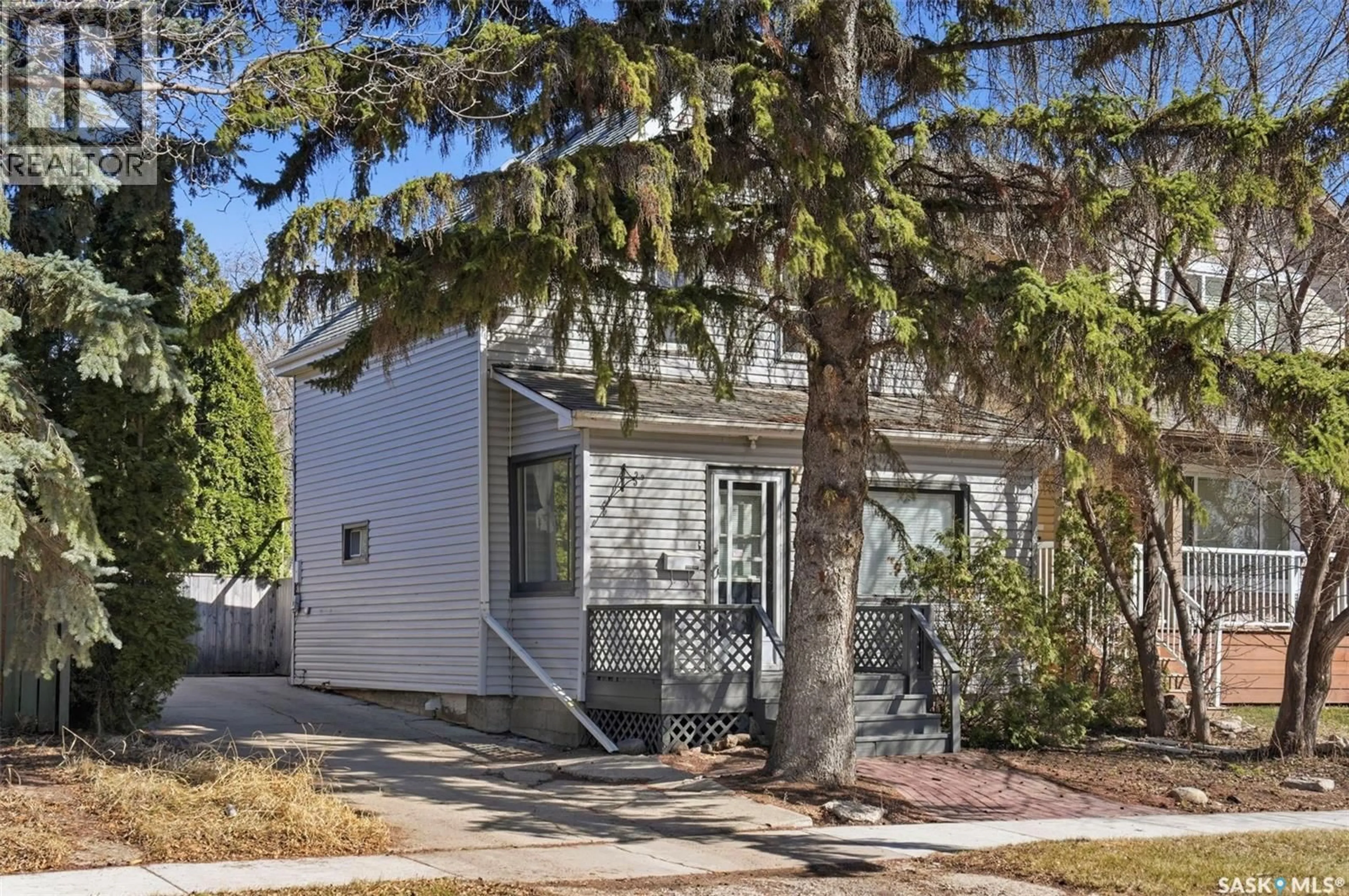 Home with vinyl exterior material, street for 1336 H AVENUE, Saskatoon Saskatchewan S7L2E4