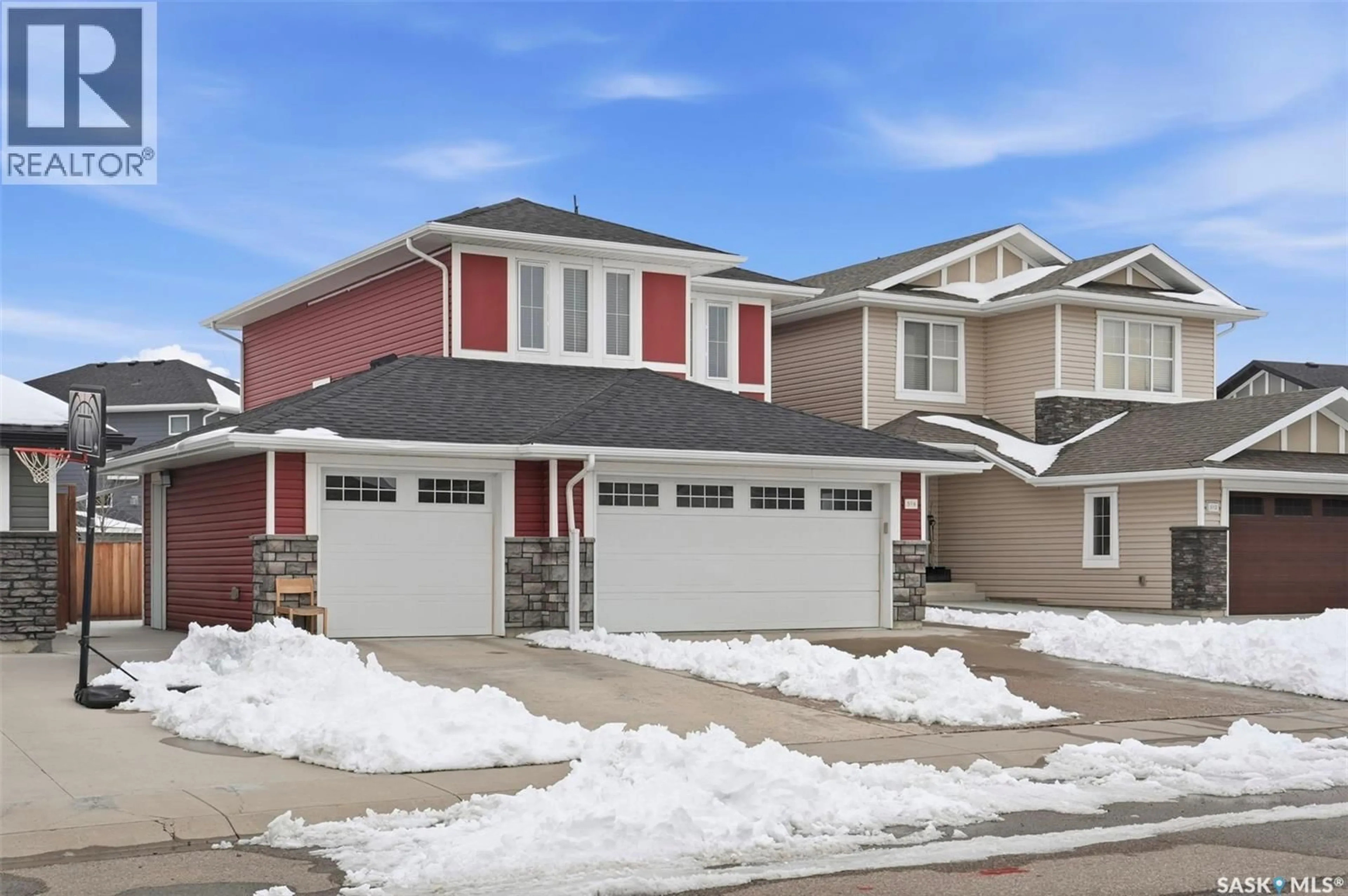 Home with vinyl exterior material, street for 516 PICHLER WAY, Saskatoon Saskatchewan S7V0G2