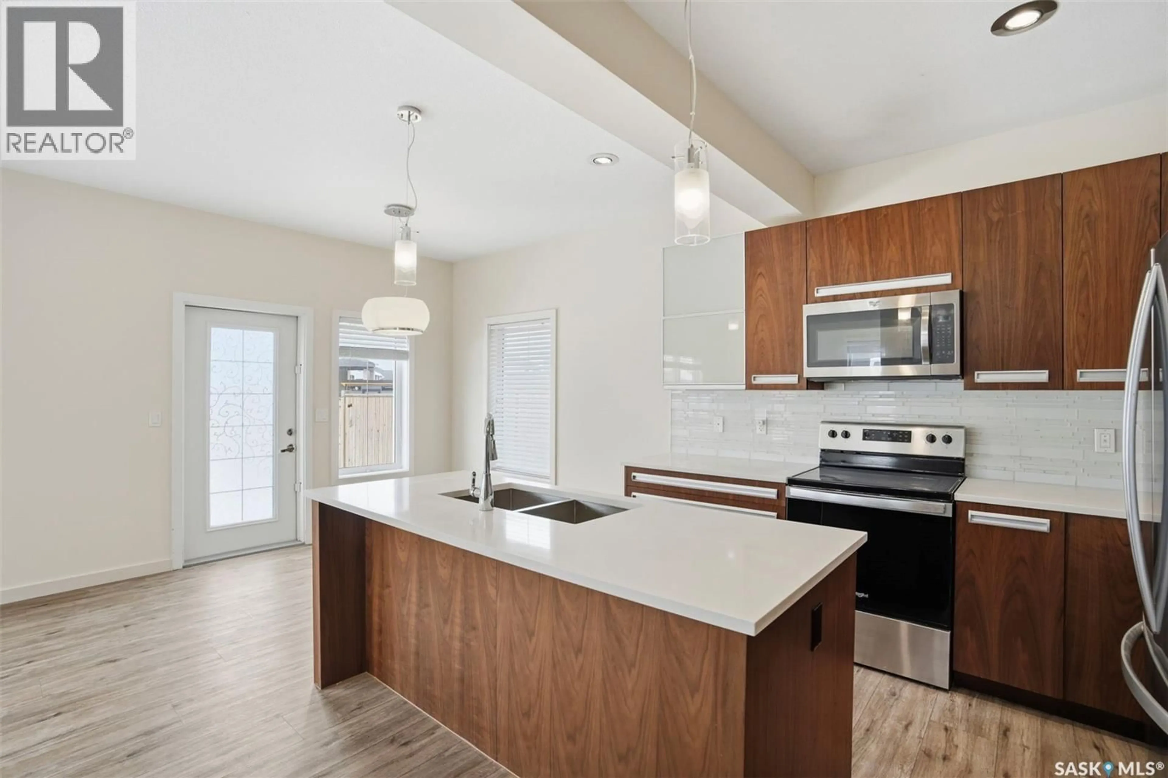 Open concept kitchen, unknown for 516 PICHLER WAY, Saskatoon Saskatchewan S7V0G2