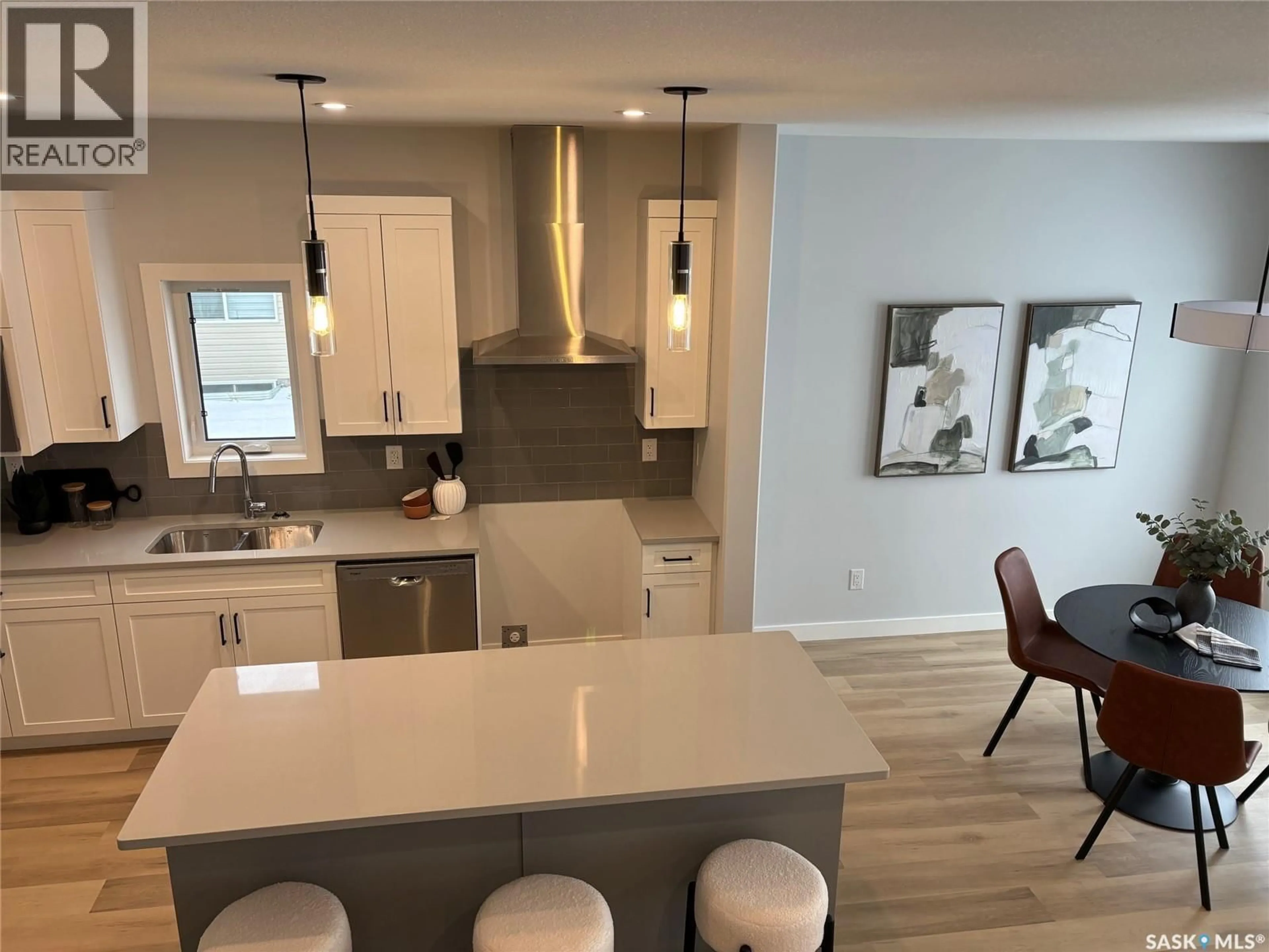 Open concept kitchen, unknown for 305 COCKCROFT STREET, Saskatoon Saskatchewan S7V1Y9