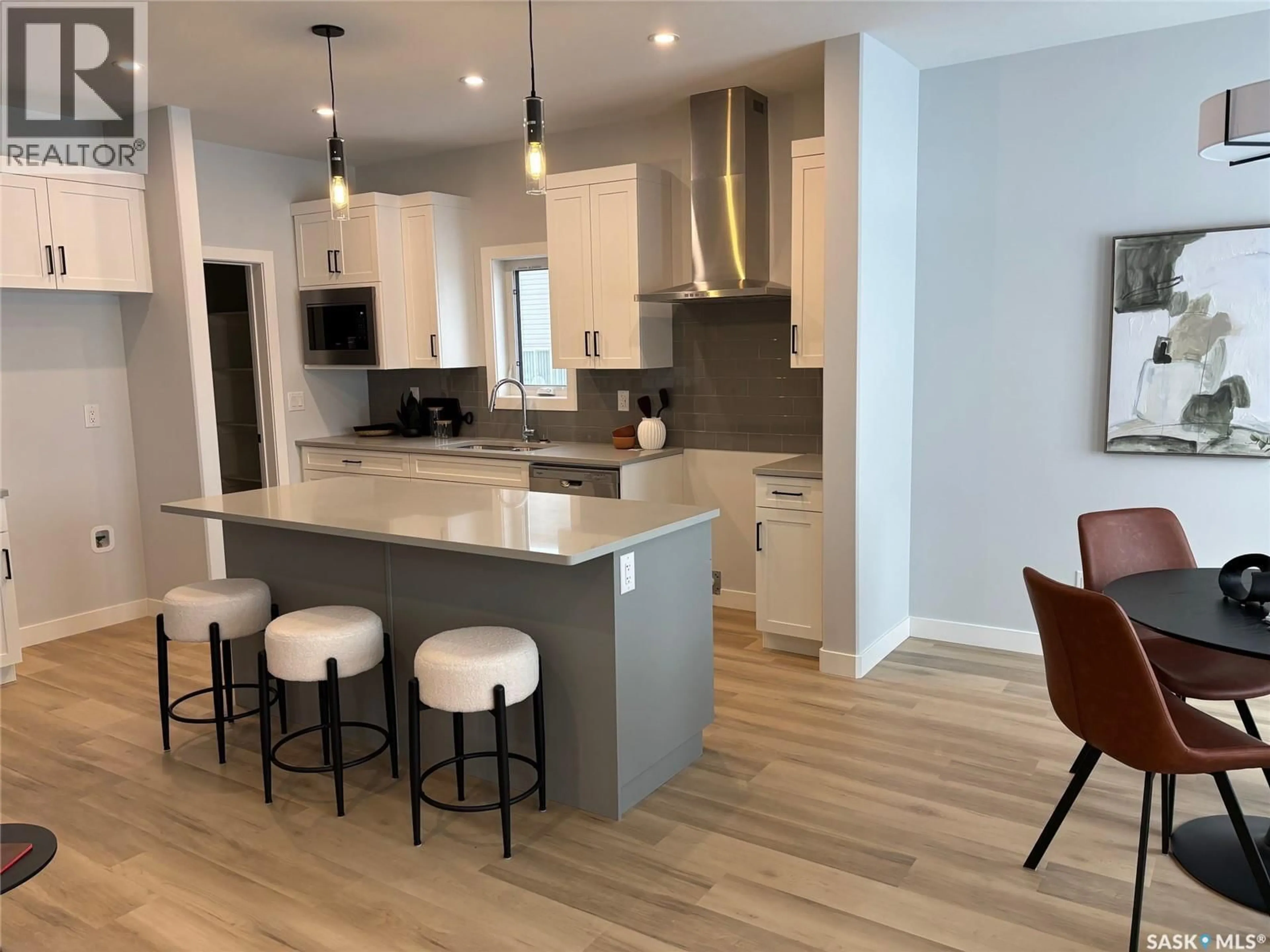 Open concept kitchen, unknown for 305 COCKCROFT STREET, Saskatoon Saskatchewan S7V1Y9