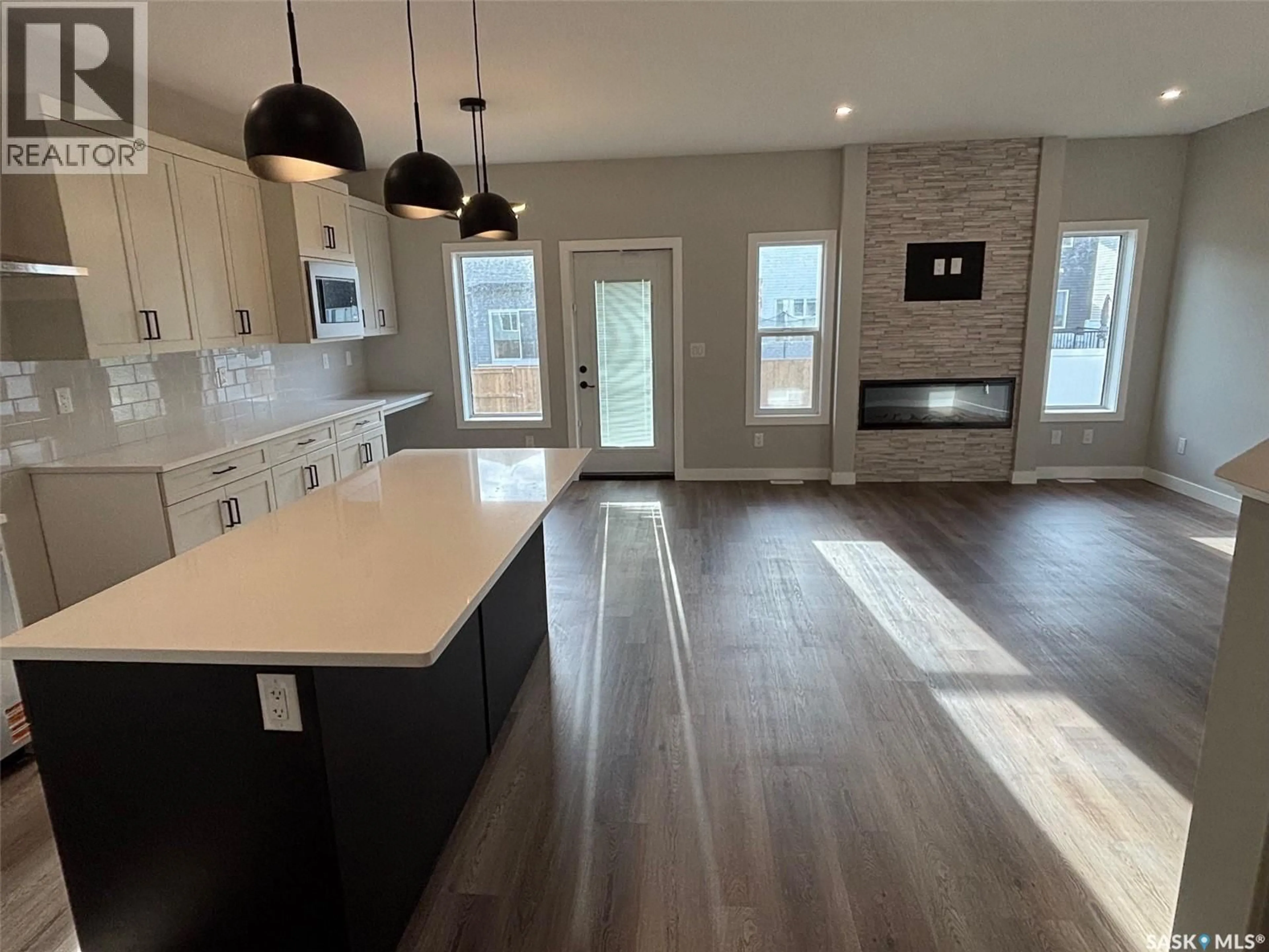 Open concept kitchen, unknown for 301 COCKCROFT STREET, Saskatoon Saskatchewan S7V1Y9
