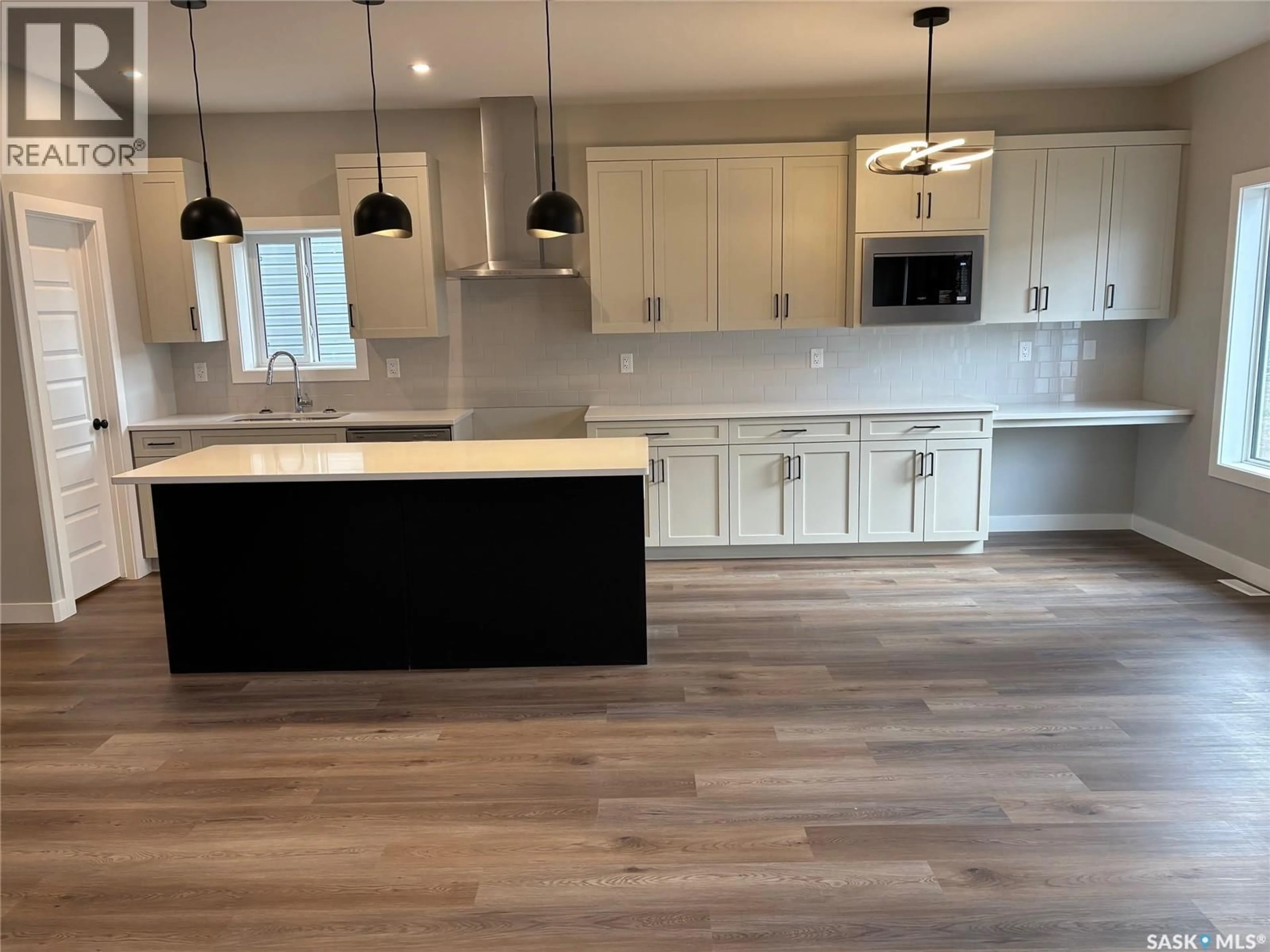 Open concept kitchen, unknown for 301 COCKCROFT STREET, Saskatoon Saskatchewan S7V1Y9