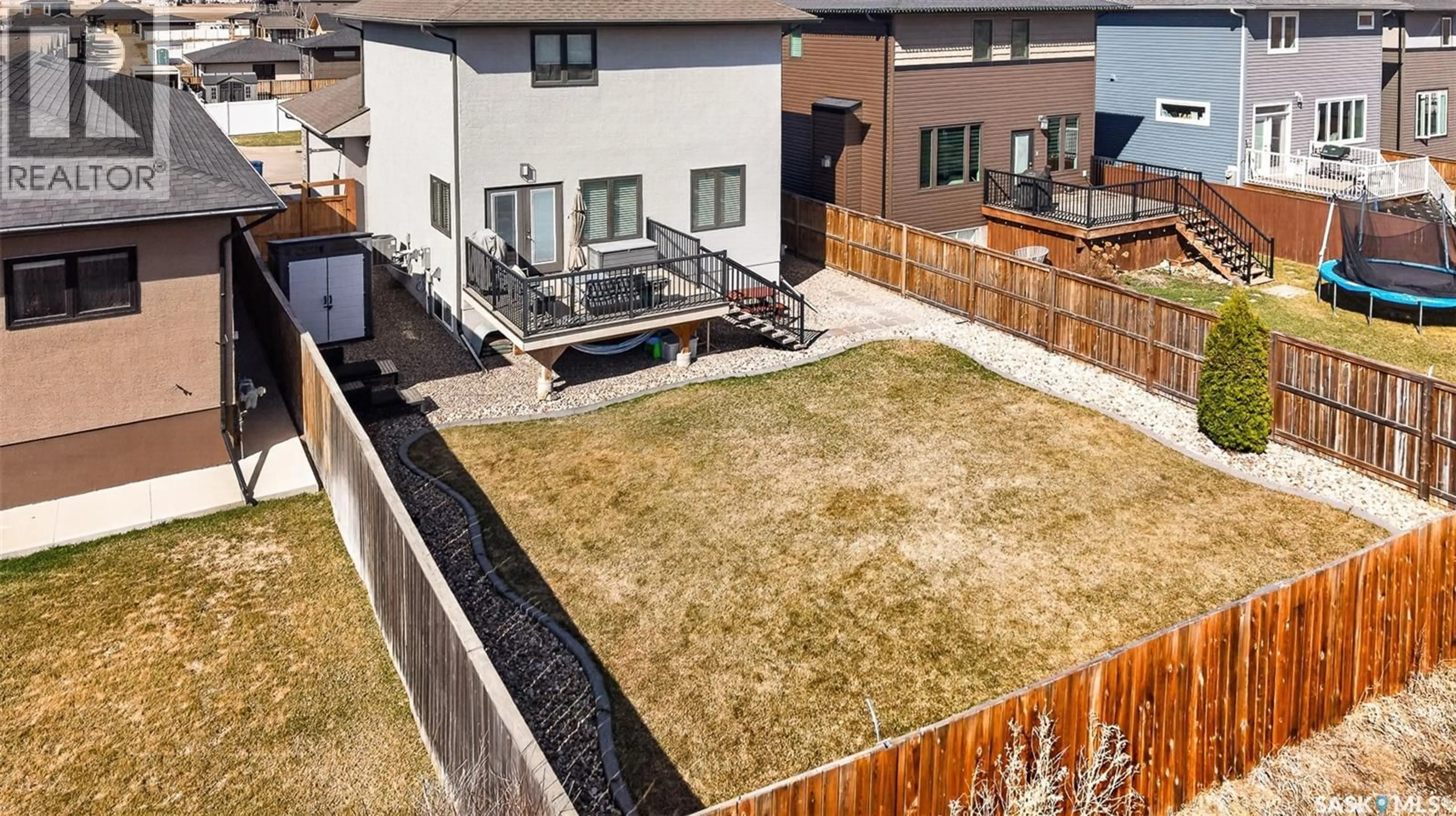 A pic from outside/outdoor area/front of a property/back of a property/a pic from drone, street for 1081 MAPLEWOOD DRIVE, Moose Jaw Saskatchewan S6J0B6