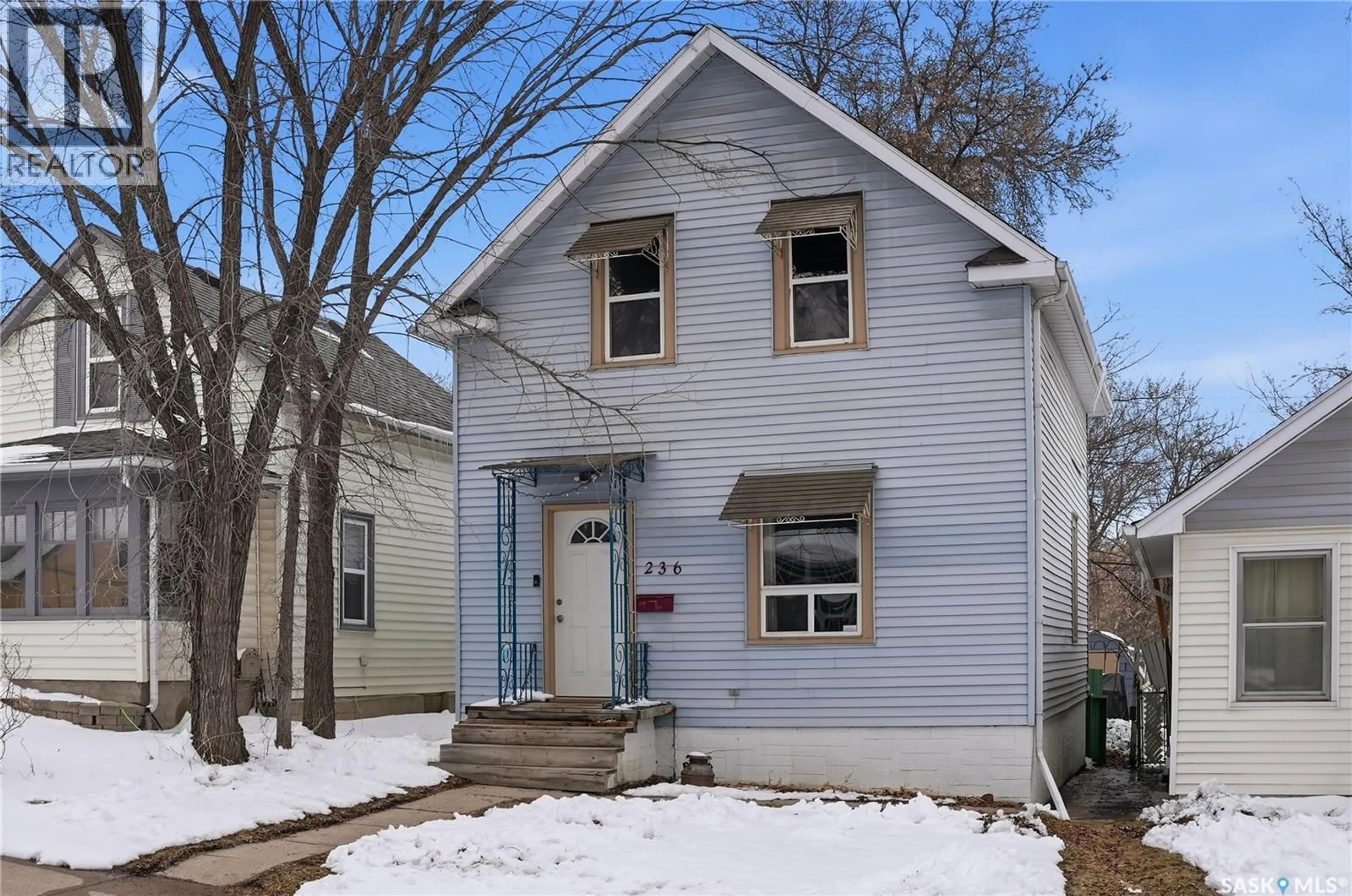 Home with vinyl exterior material, street for 236 I AVENUE, Saskatoon Saskatchewan S7L0G4