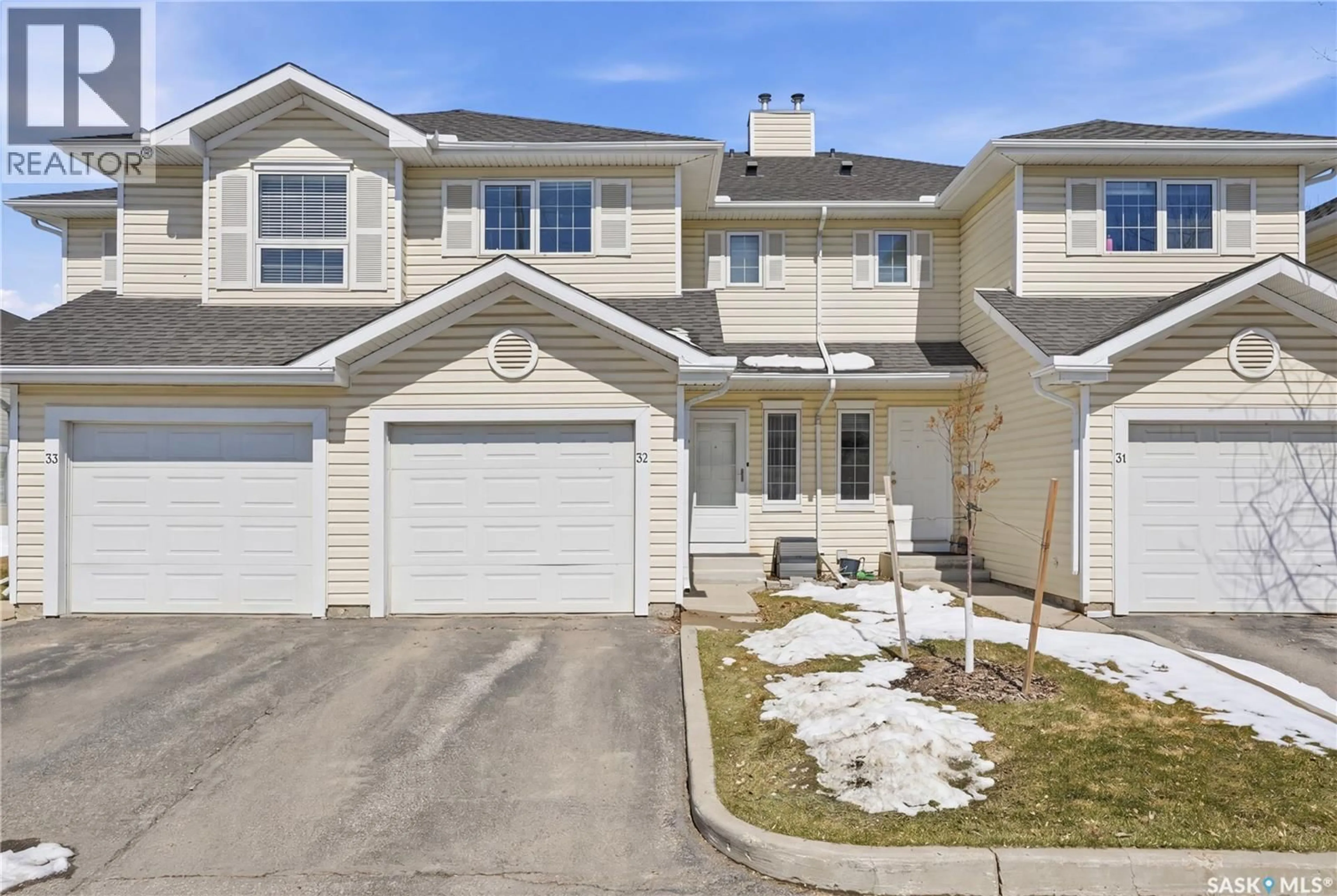 Home with vinyl exterior material, street for 32 111 FAIRBROTHER CRESCENT, Saskatoon Saskatchewan S7S1L3
